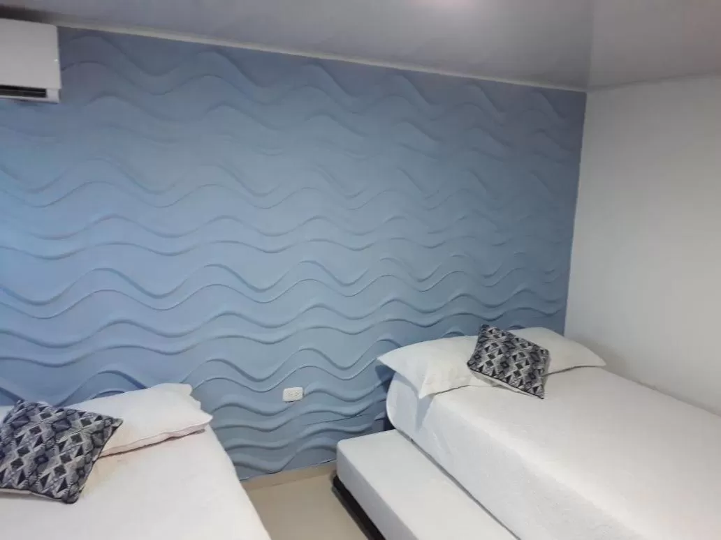 Bed in Apartamentos Isla Tropical