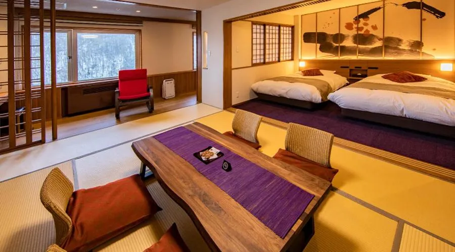 Bed in Hotel Taisetsu Onsen&Canyon Resort