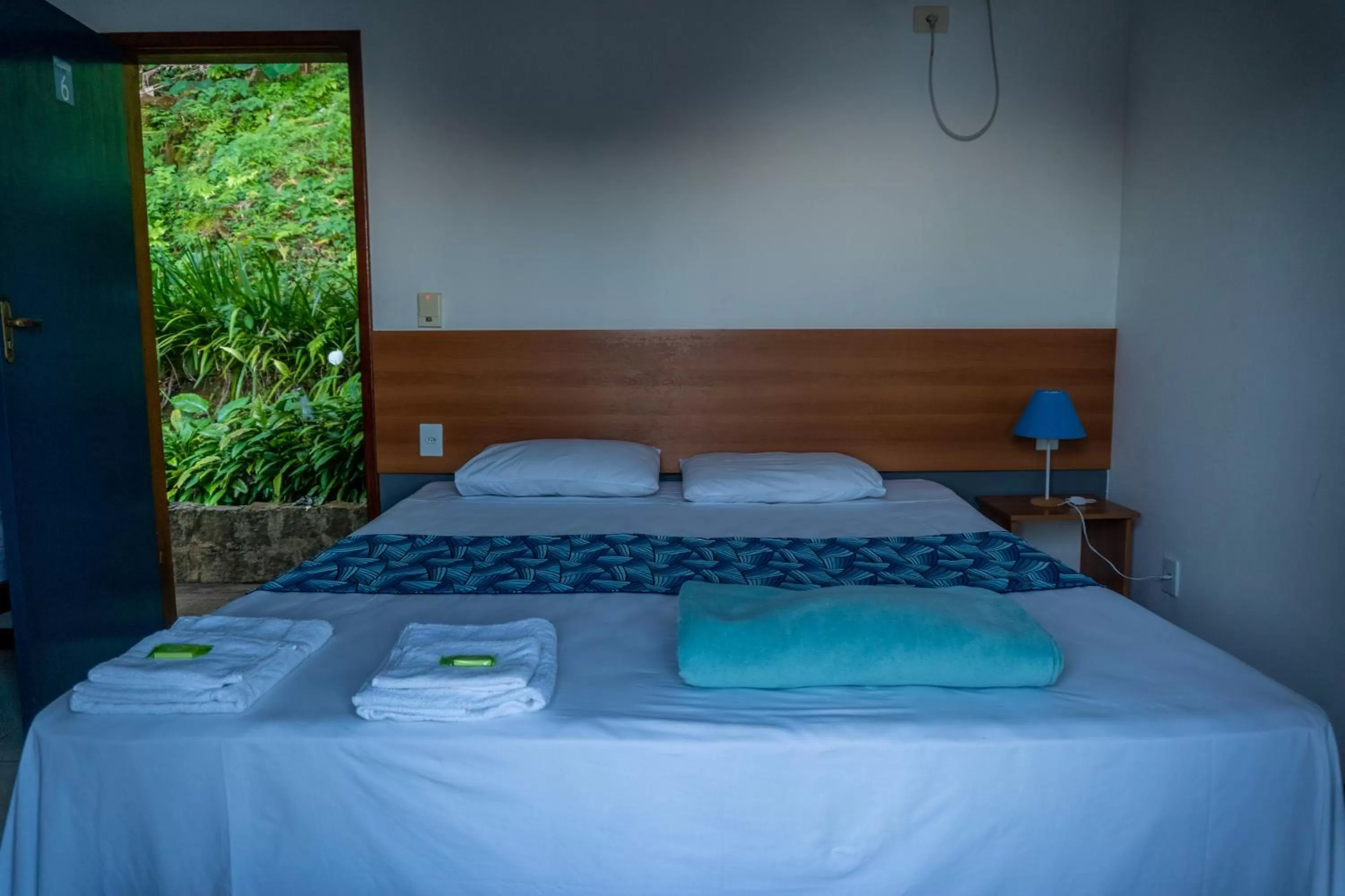 Bed in Pousada Piquara