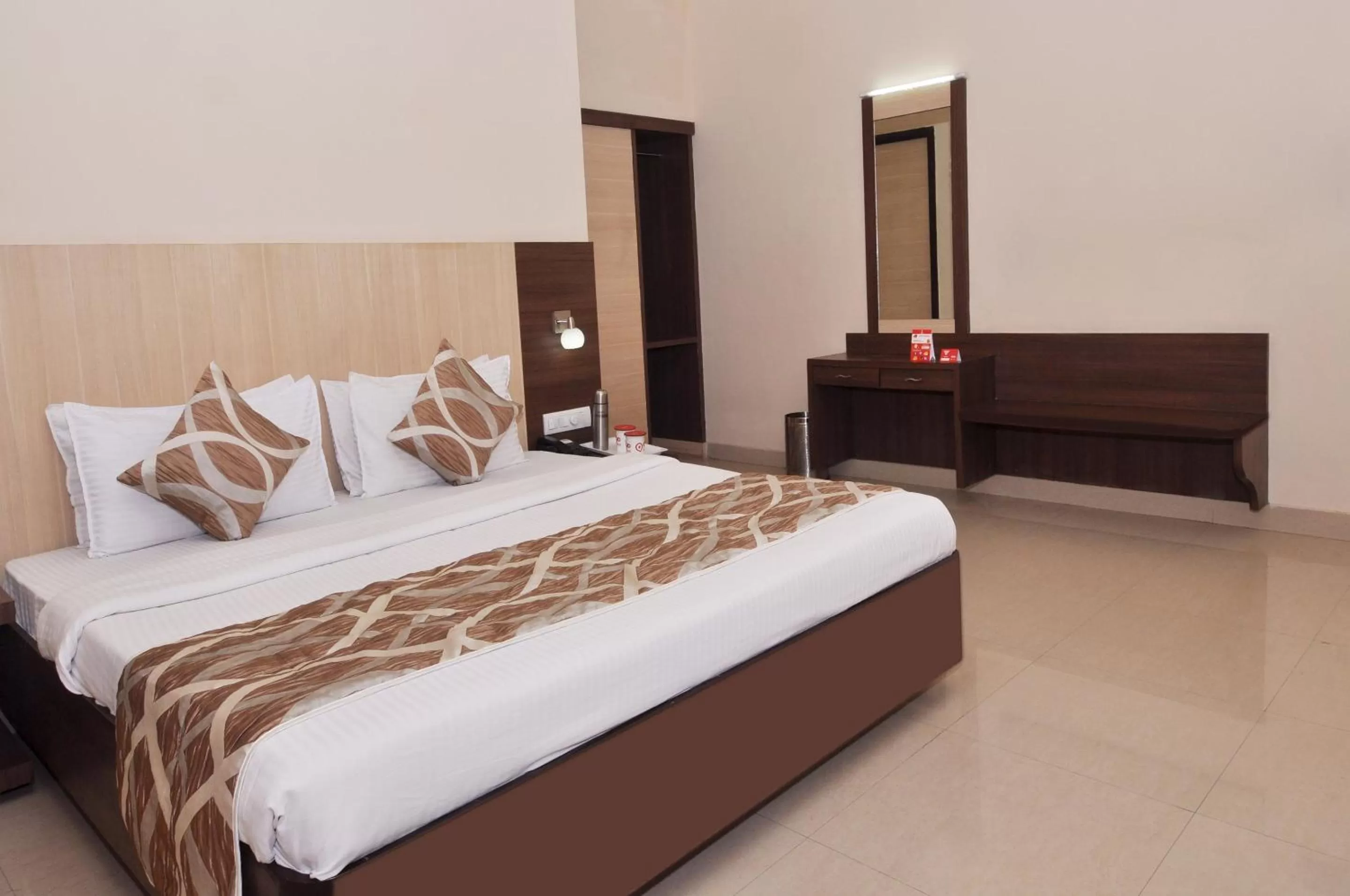 Photo of the whole room, Bed in Sivamurugan Hotels