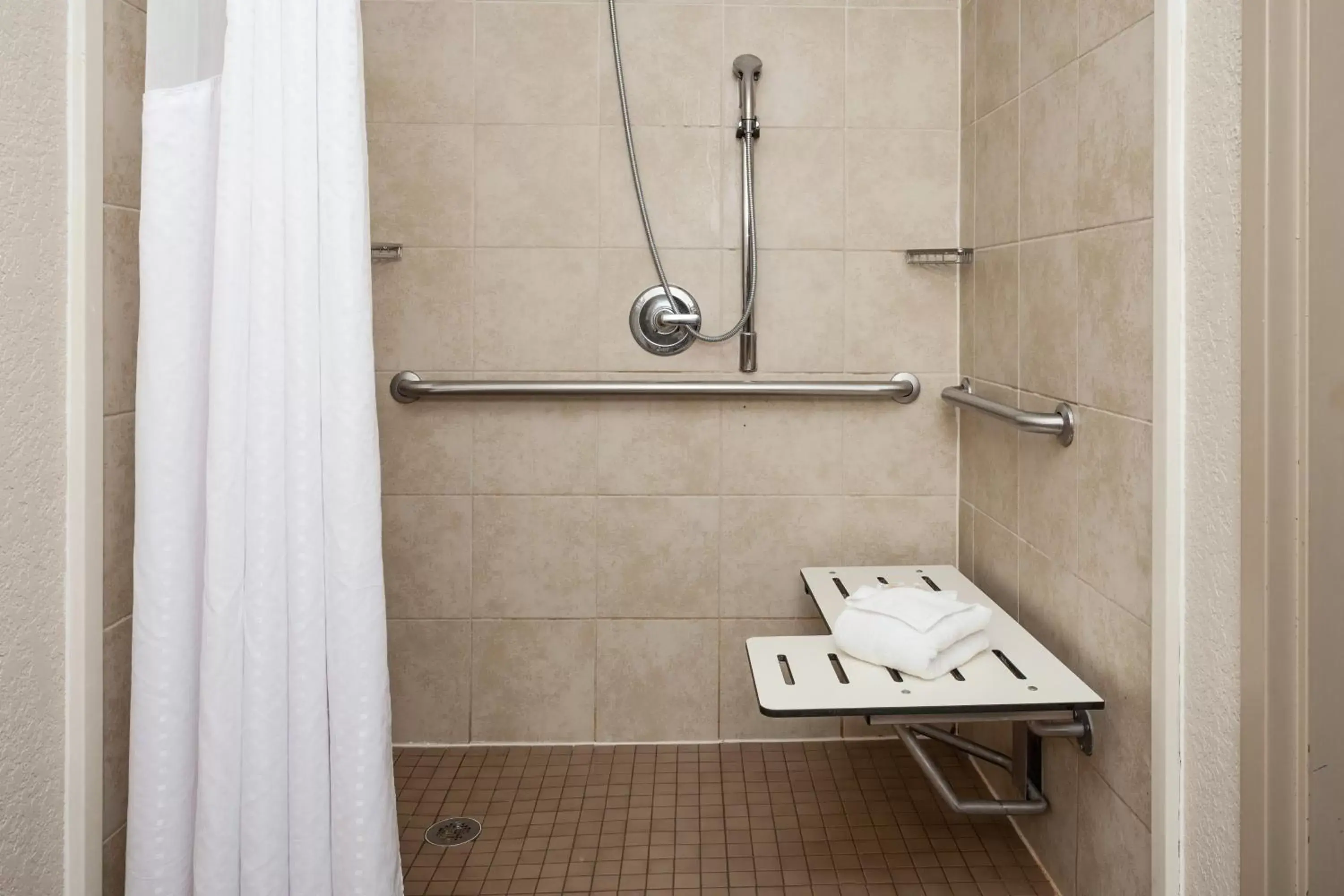 One-Bedroom Suite with Roll-In Shower - Mobility Accessible in Holiday Inn San Antonio Northwest- SeaWorld Area by IHG One-Bedroom Suite with Roll-In Shower - Mobility Accessible in Holiday Inn San Antonio Northwest- SeaWorld Area by IHG