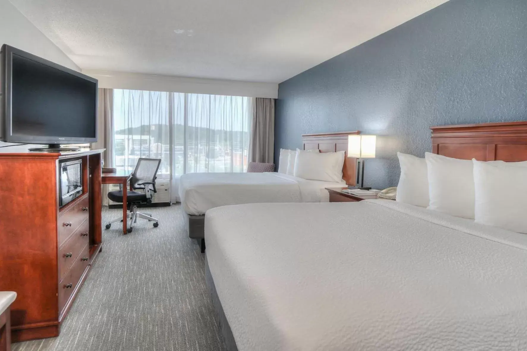 Bed in The Ramsey Hotel and Convention Center Bed in The Ramsey Hotel and Convention Center