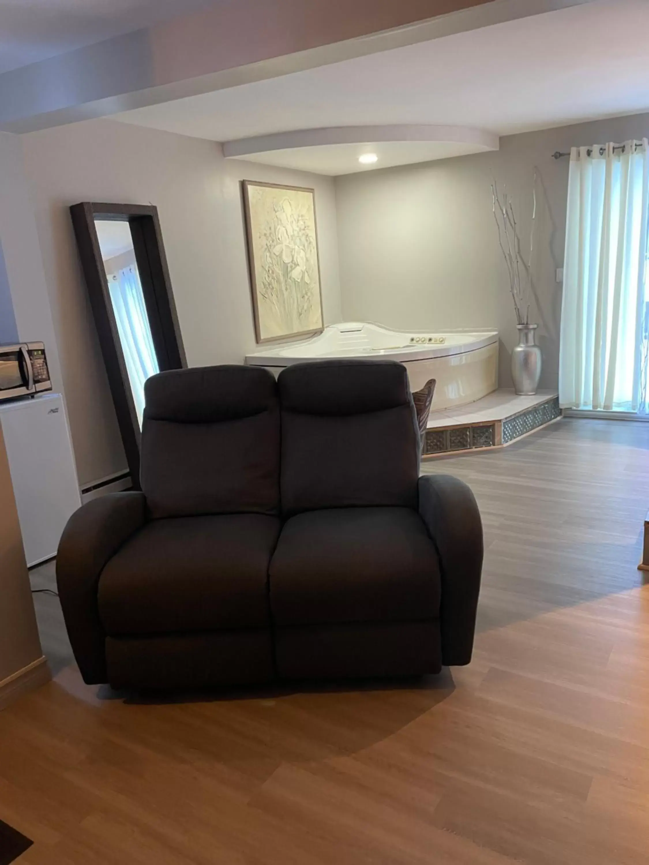 Bedroom, Seating Area in Motel du rosier