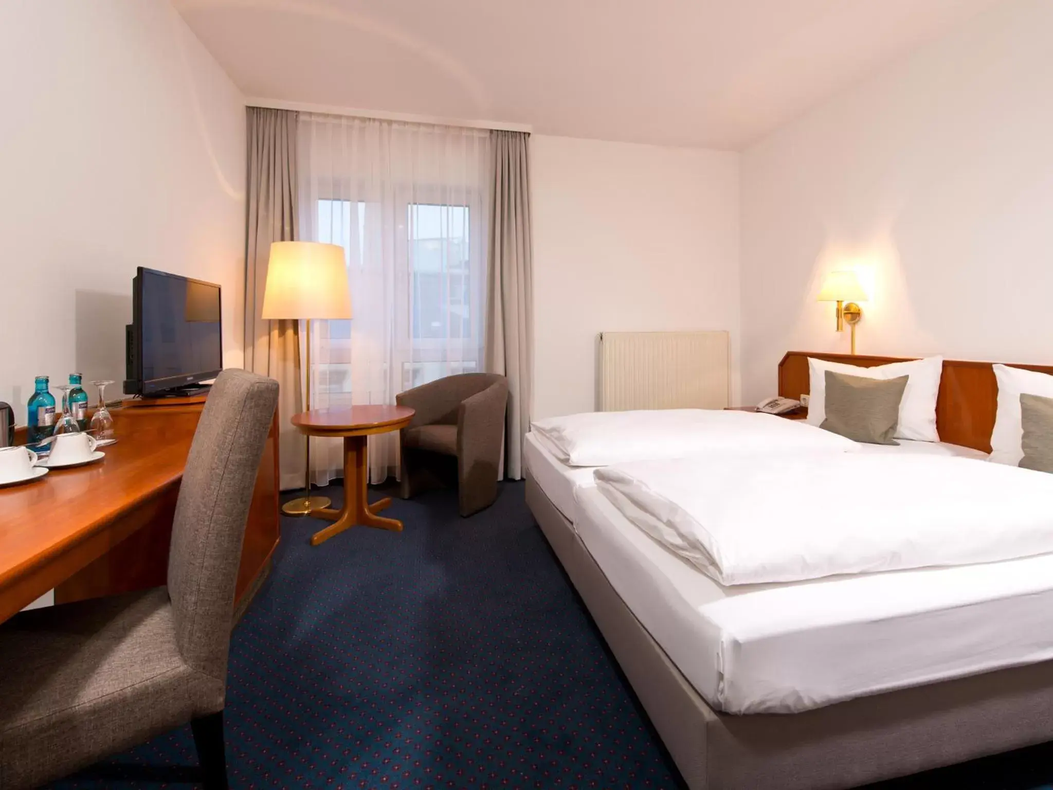 Photo of the whole room, Bed in ACHAT Hotel Neustadt an der Weinstraße