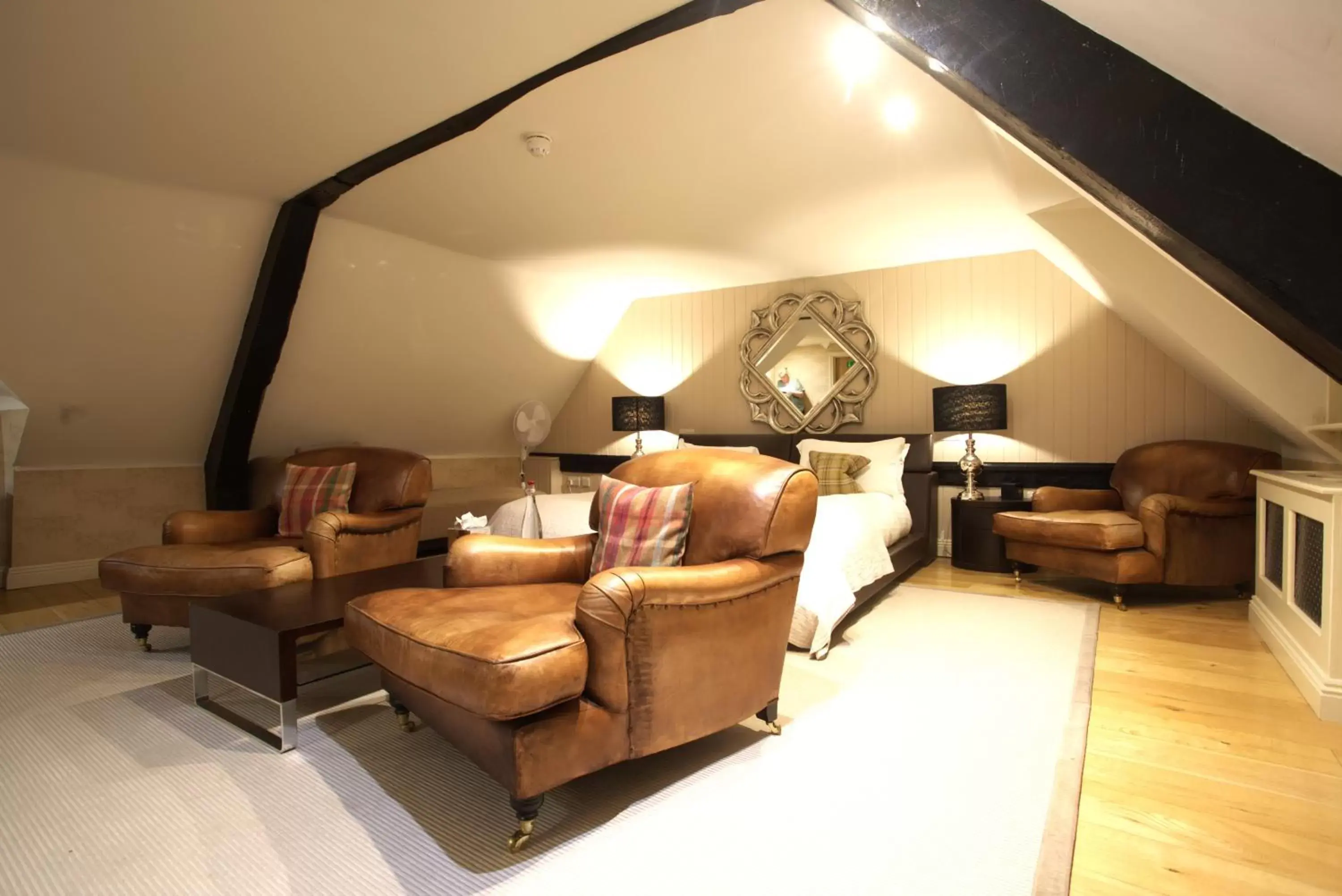 Bed, Seating Area in The White Horse Hotel, Romsey, Hampshire