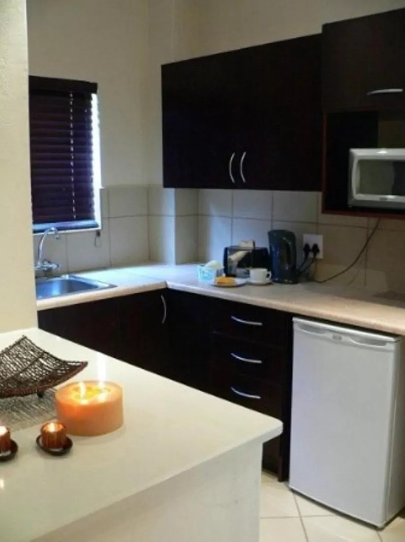 Kitchen or kitchenette in Rustenburg Boutique Hotel
