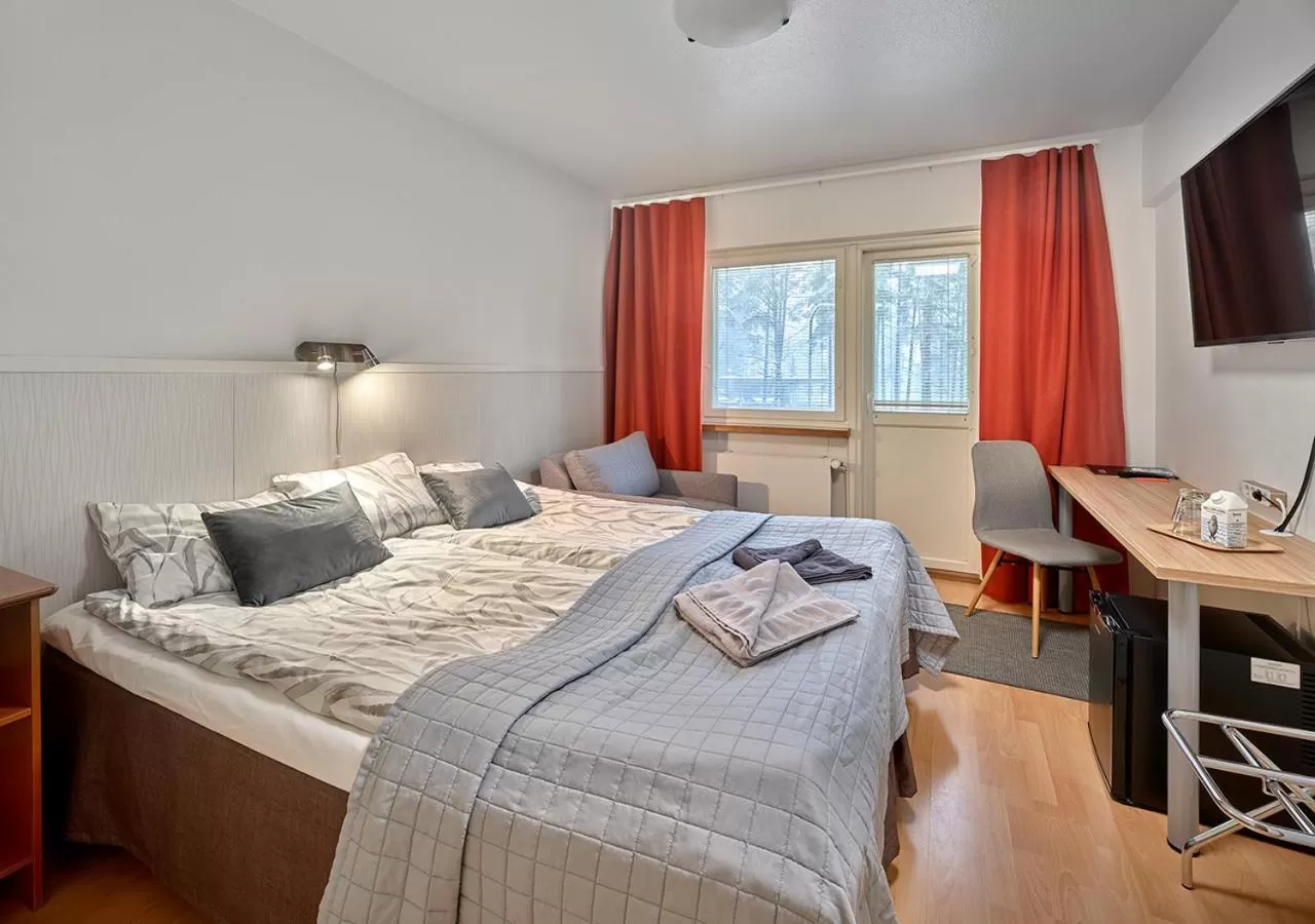 Photo of the whole room, Bed in Hotelli-Ravintola Gasthaus Lohja