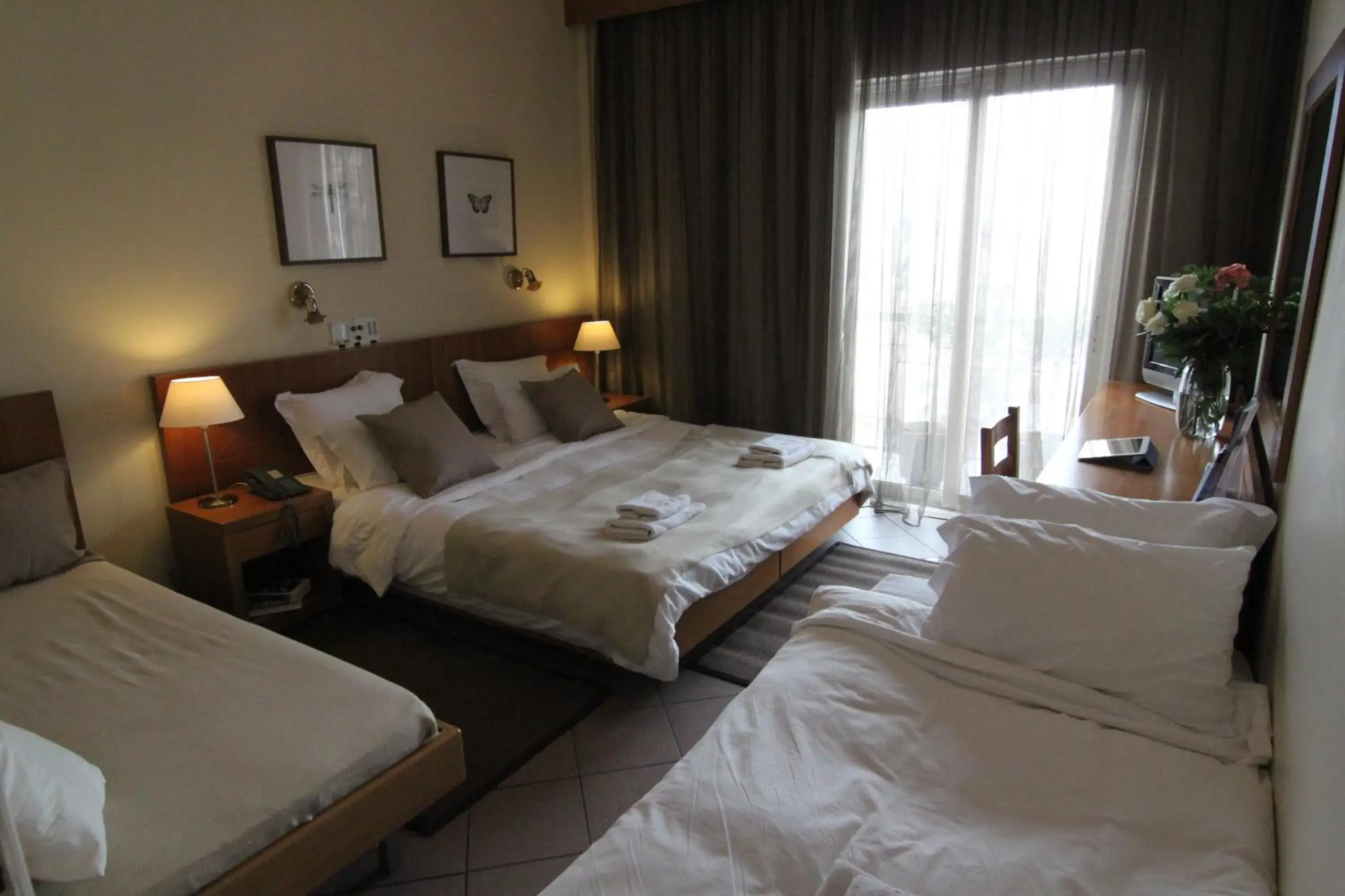 Bed in Achillion Hotel