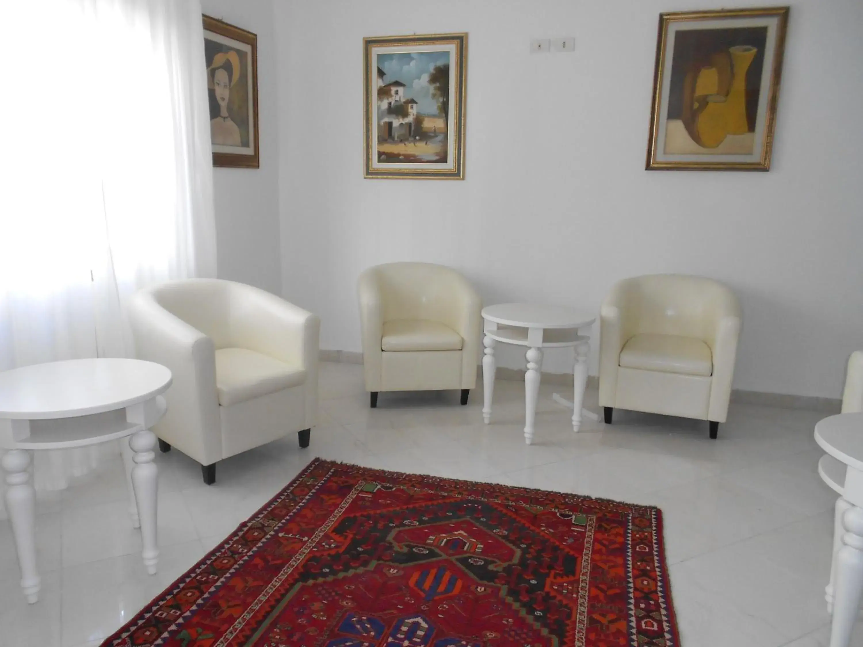 Communal lounge/ TV room, Seating Area in Hotel Laguna Blu