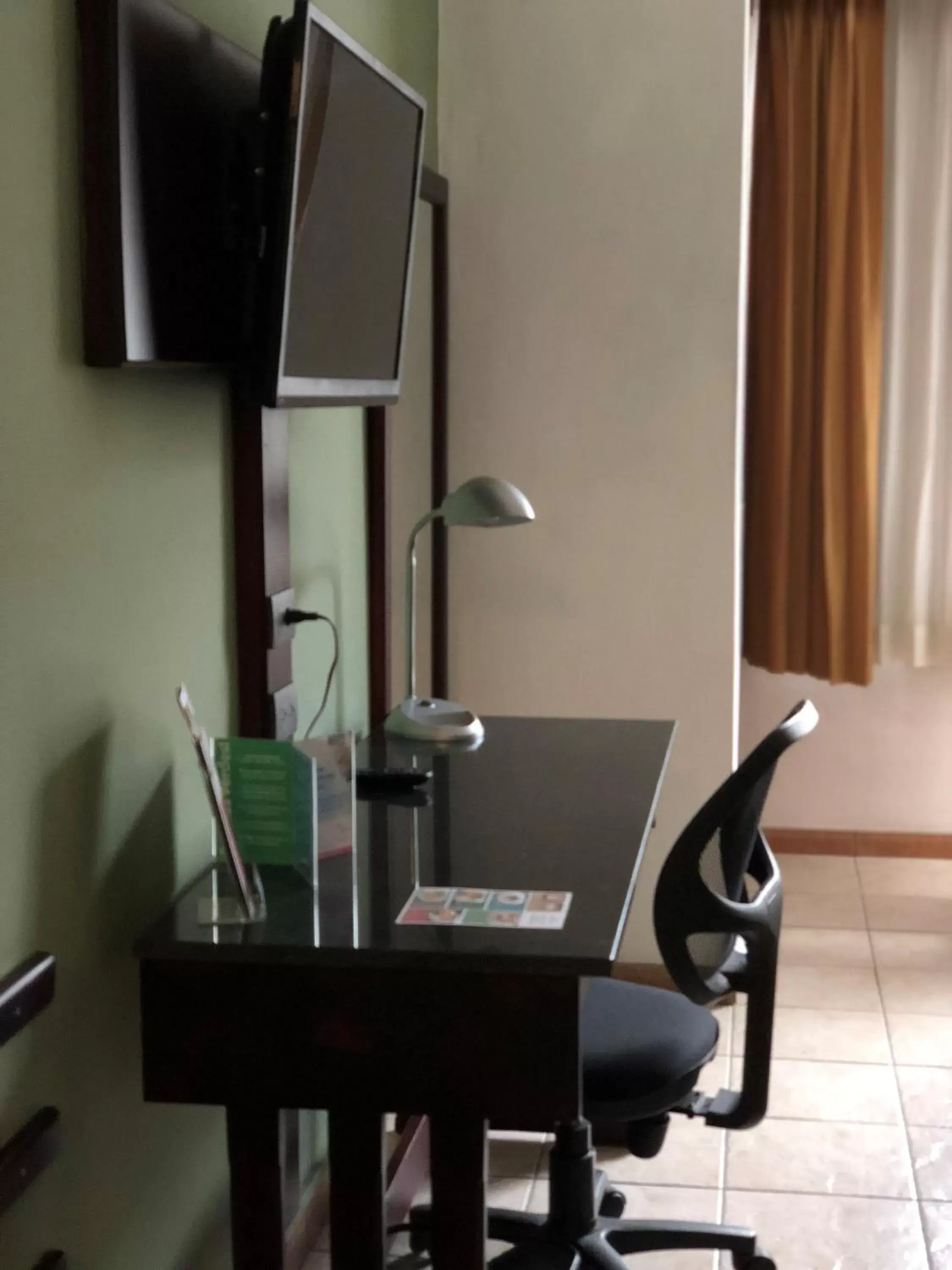 Seating area, TV/Entertainment Center in La Sabana Hotel Suites Apartments