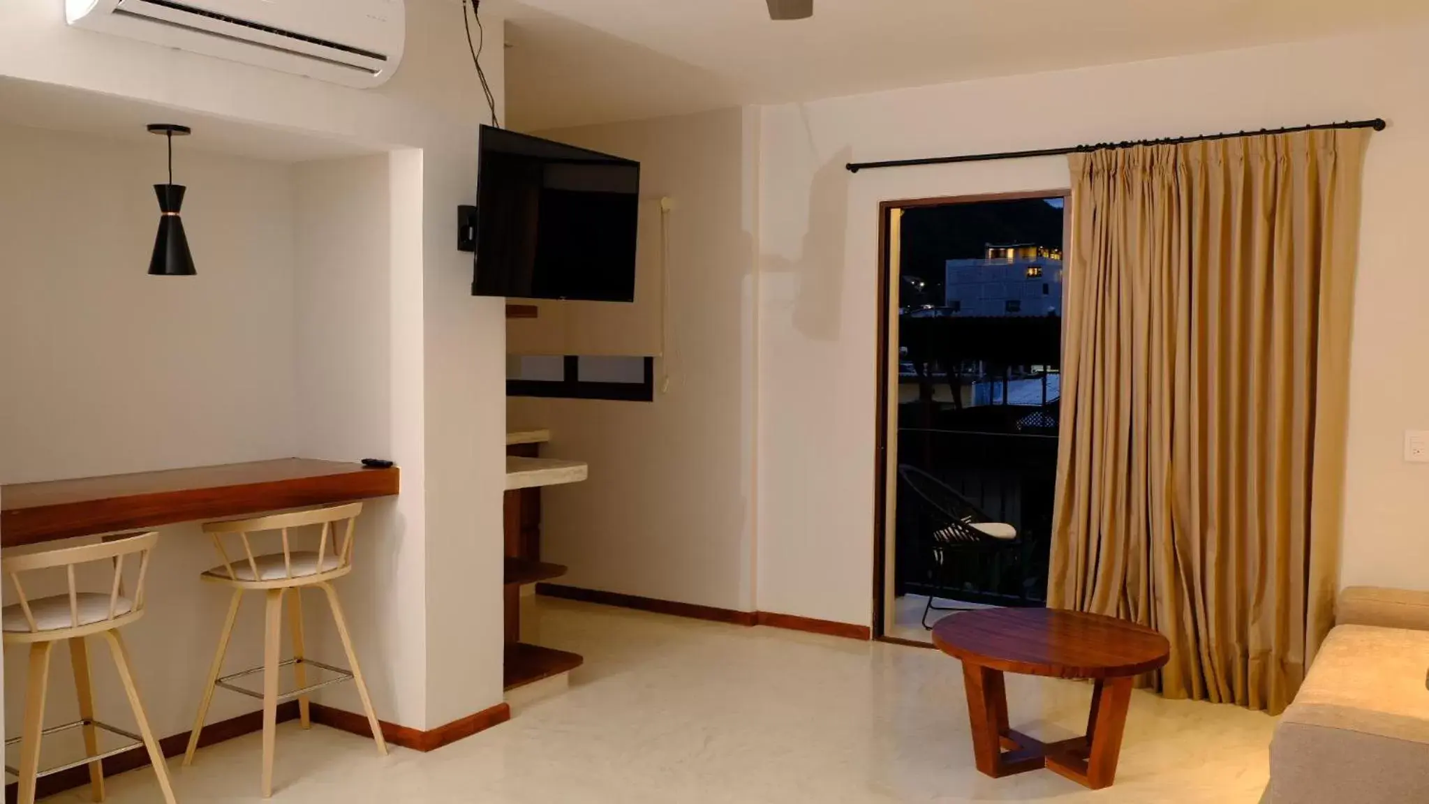 Seating area, TV/Entertainment Center in Hotel Eloisa