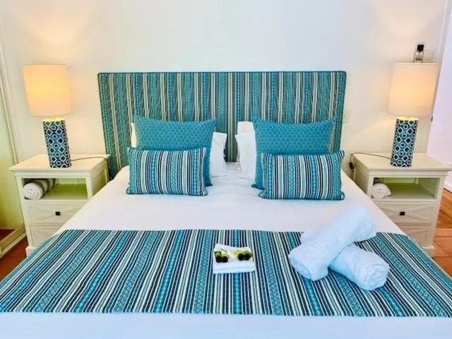 Bed in BeachView Apartments at Villa Paradiso