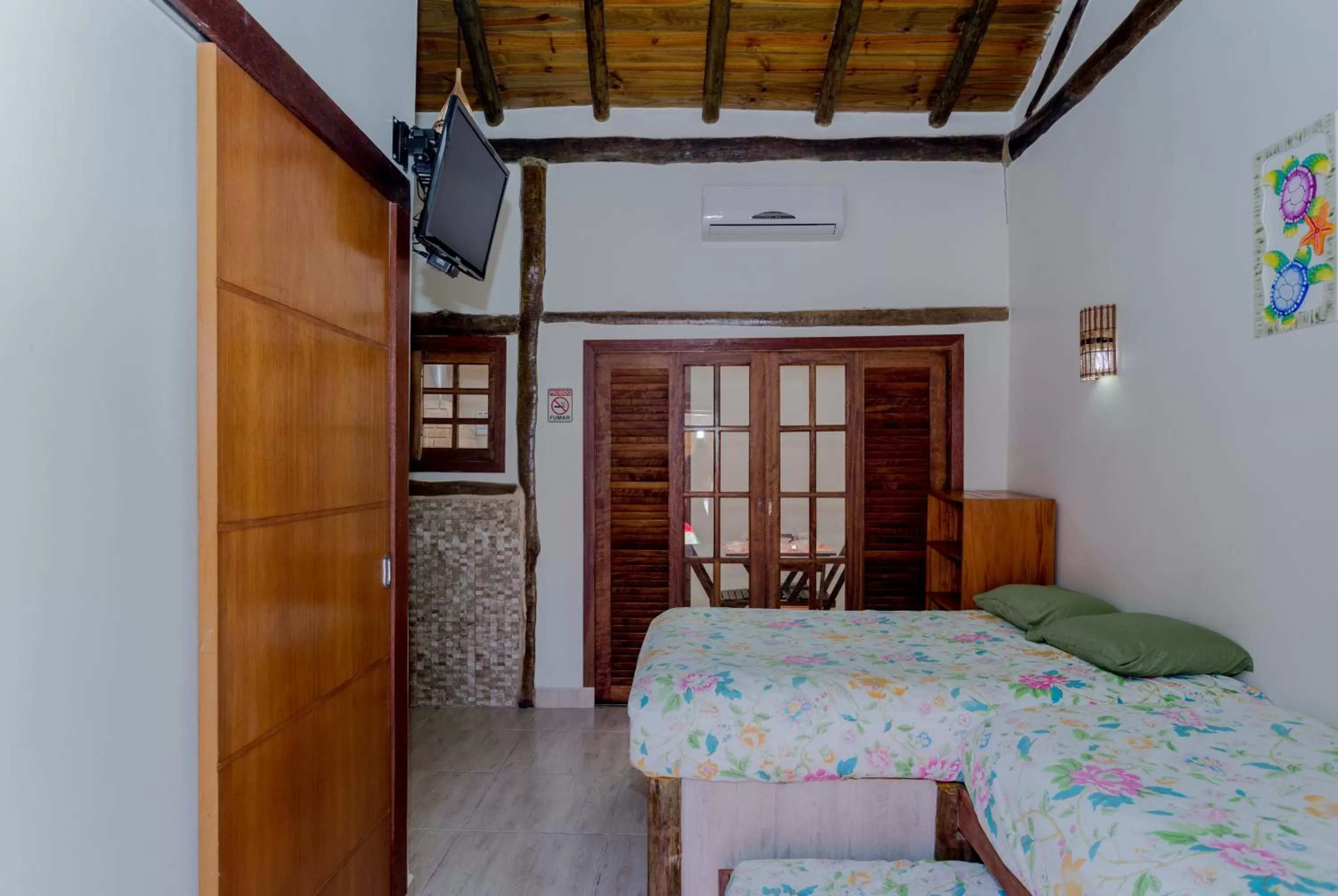 Photo of the whole room, Bed in Pousada Chalés do Julião