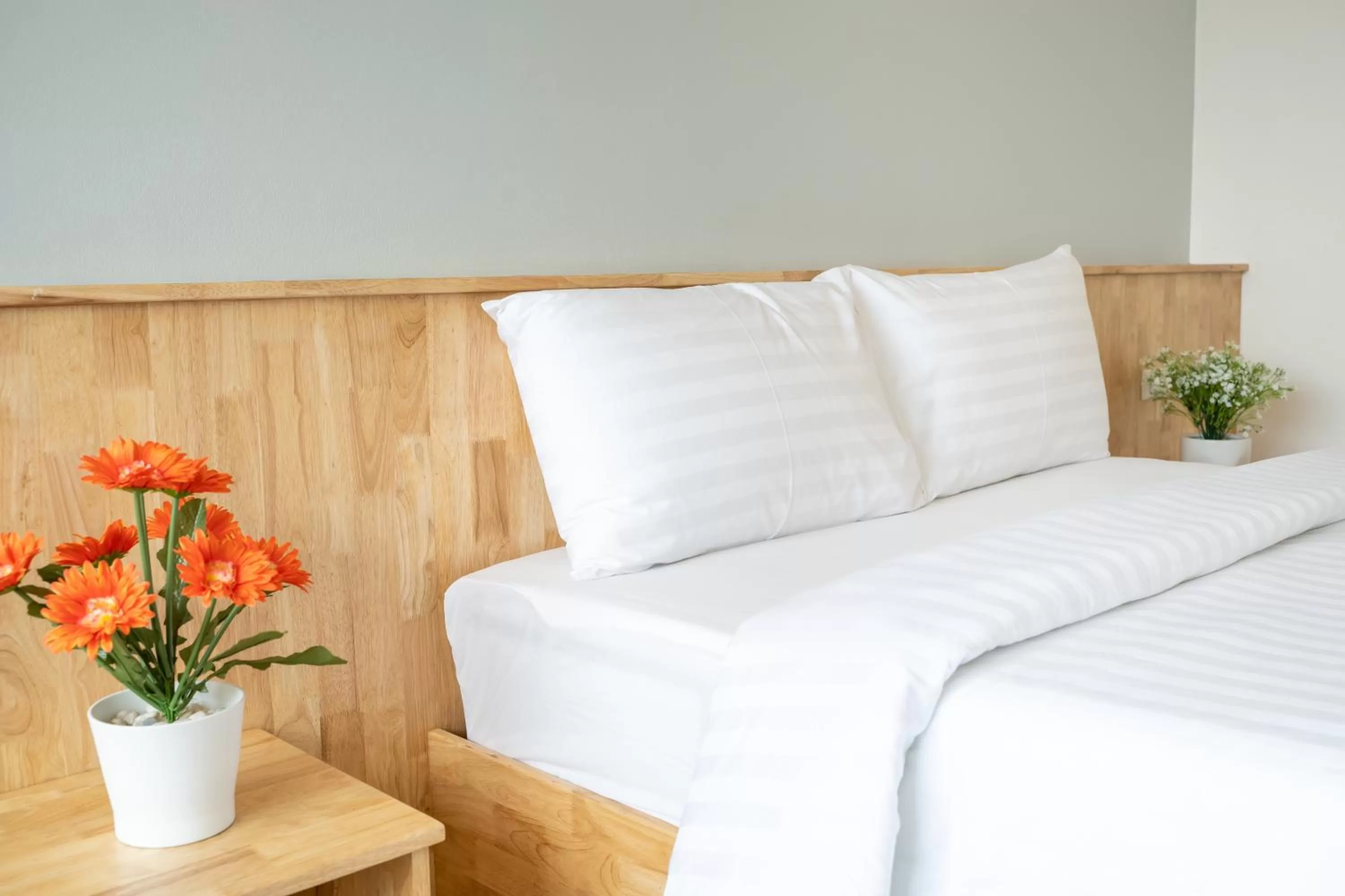 Bed in Meesuk ChiangRai Hotel, SHA Certified