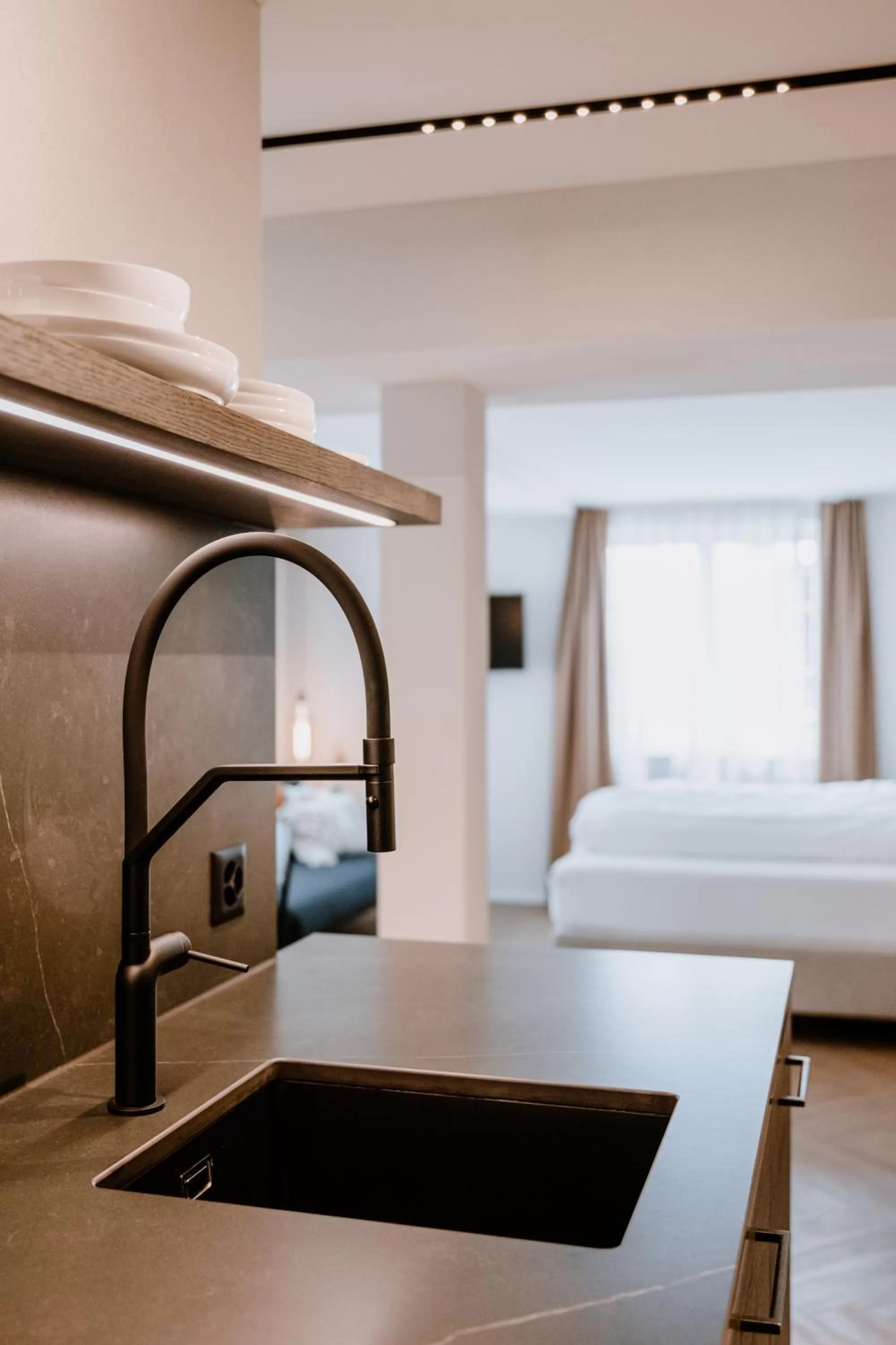 Kitchen or kitchenette, Bed in Hotel Müllers Self-Check-In