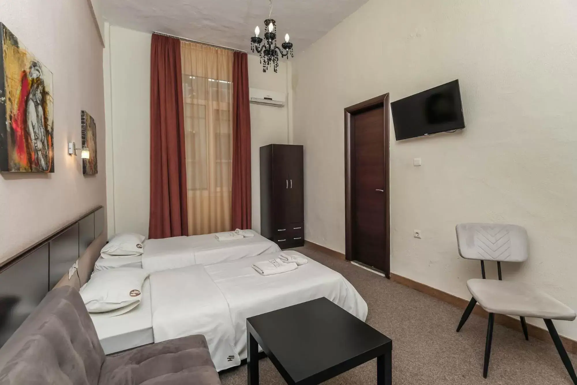Bed in Hotel Ilisia
