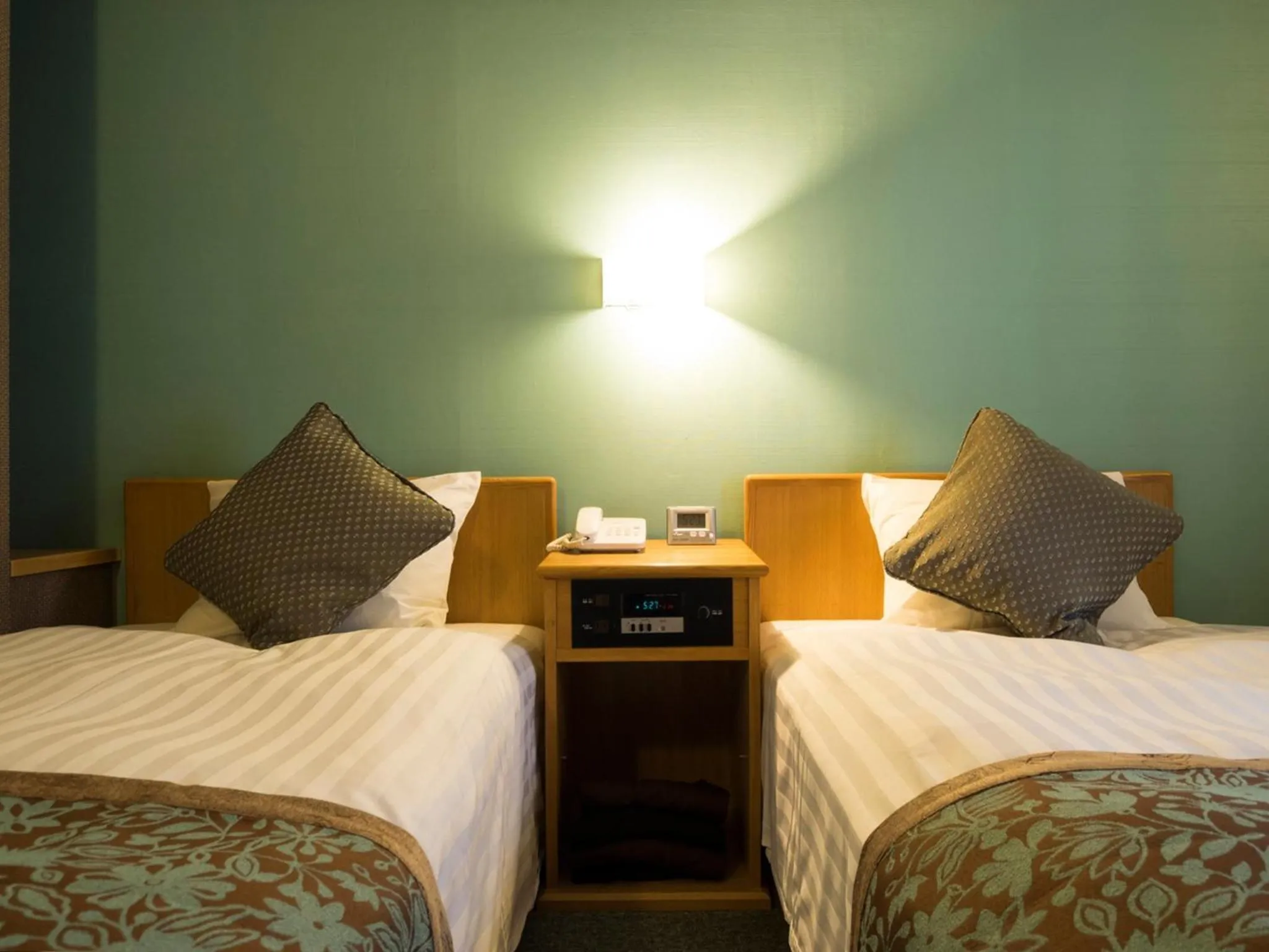 Bed in Hotel AreaOne Kushiro