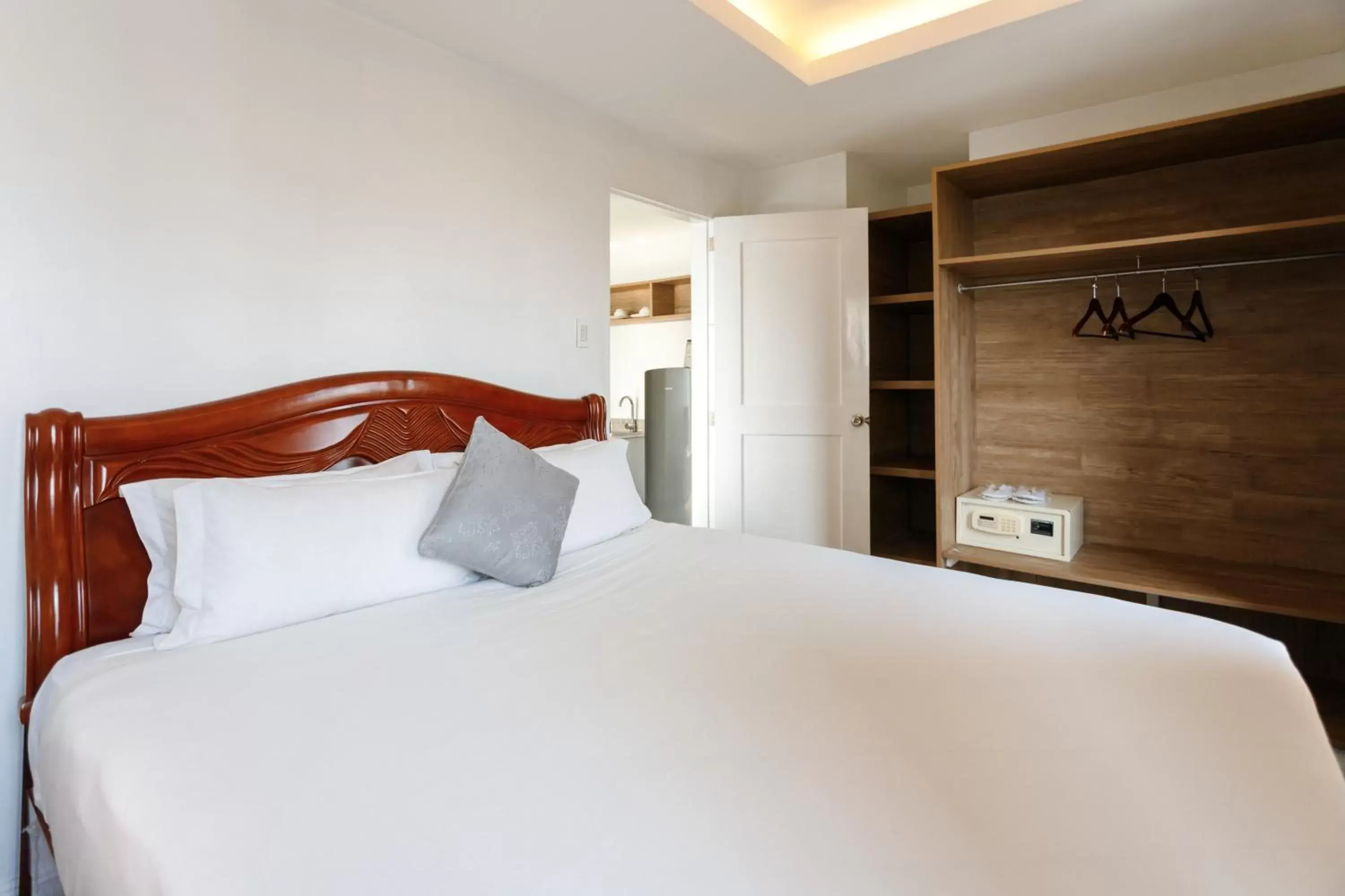 Bed in Regency Grand Suites