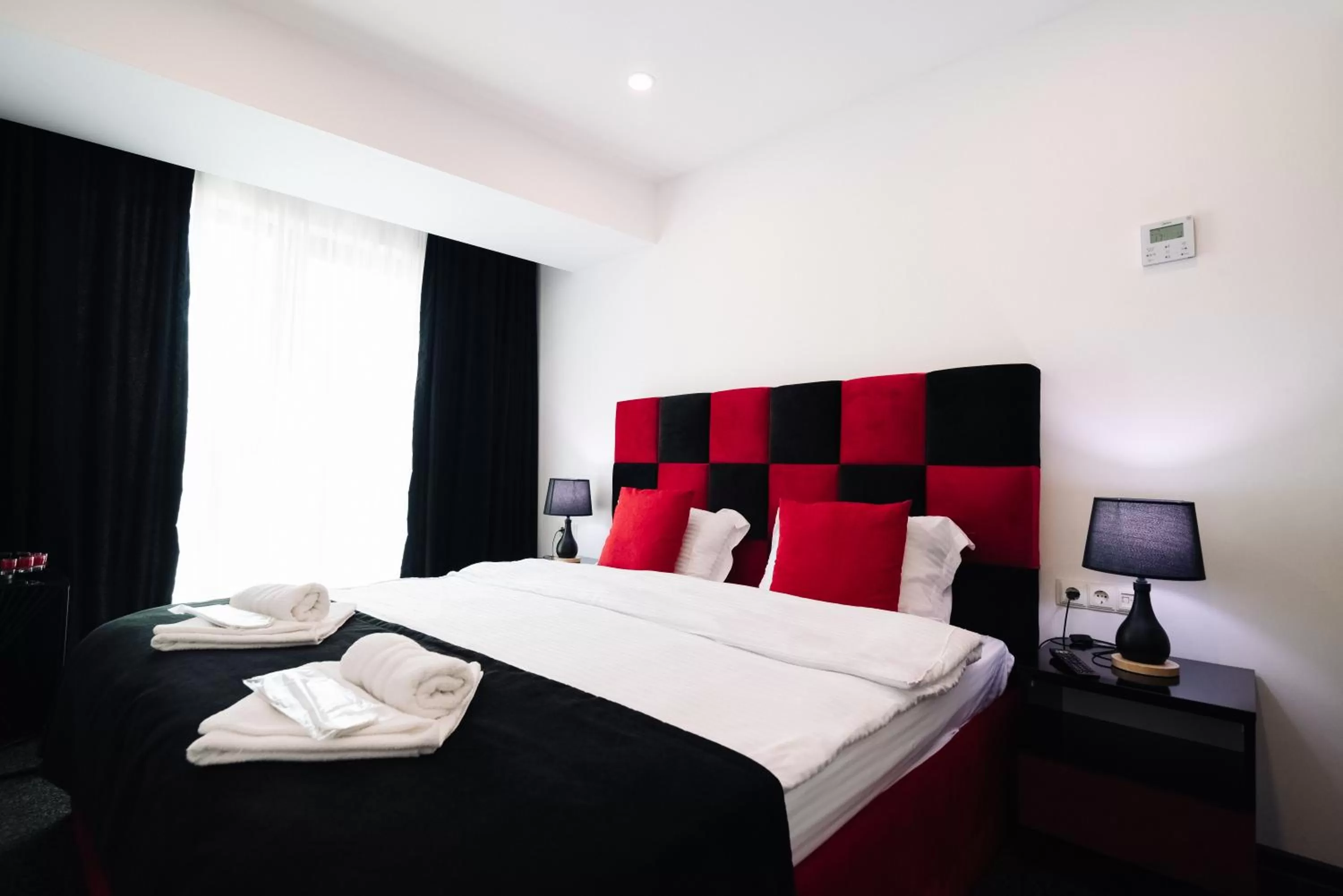 Bed in Royal Plaza Hotel