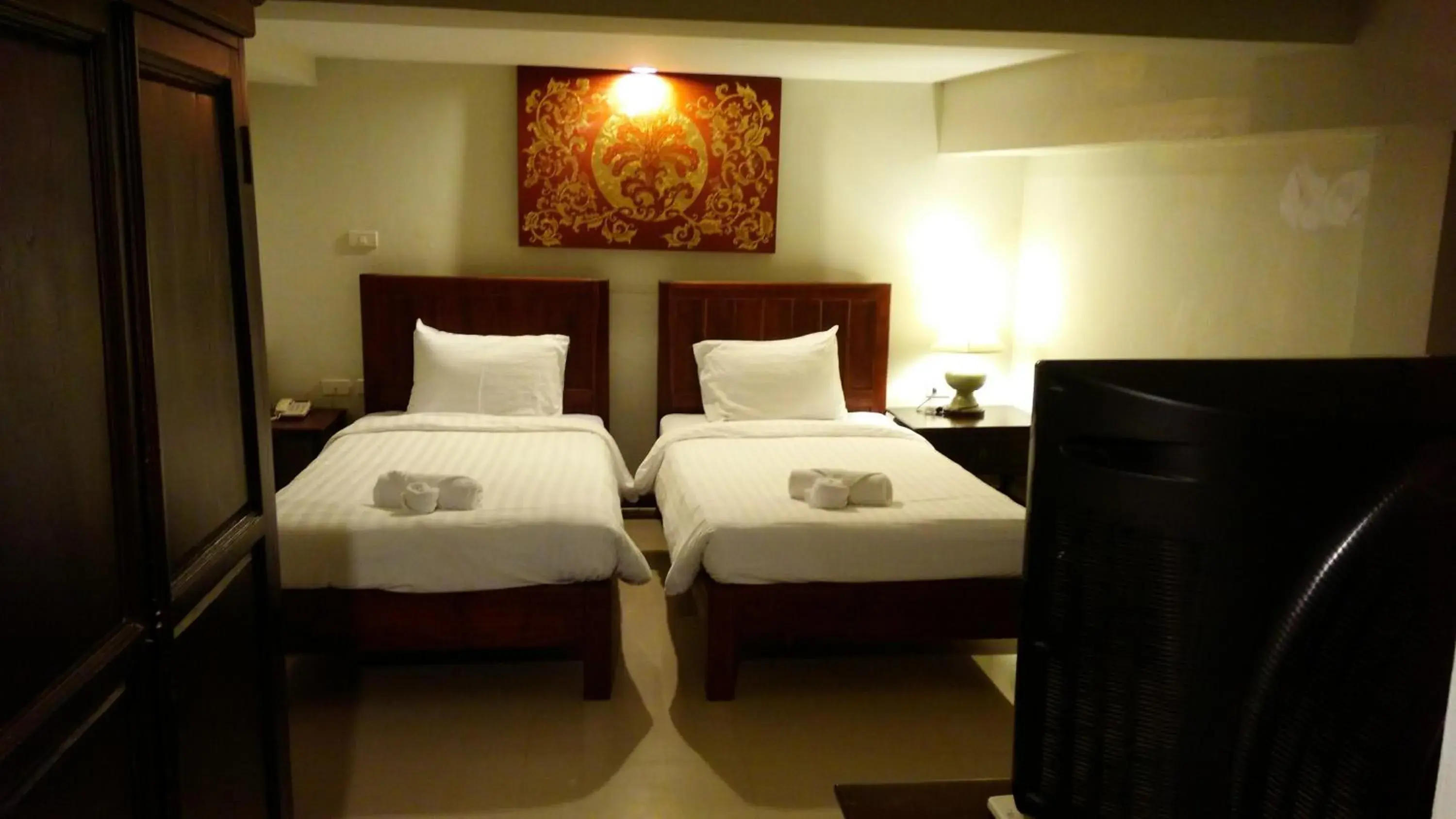 Bed in Swankaburi Boutique Hotel