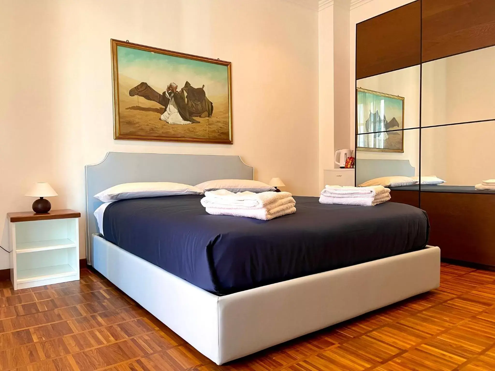 Bed in Tribus Boutique Hotel