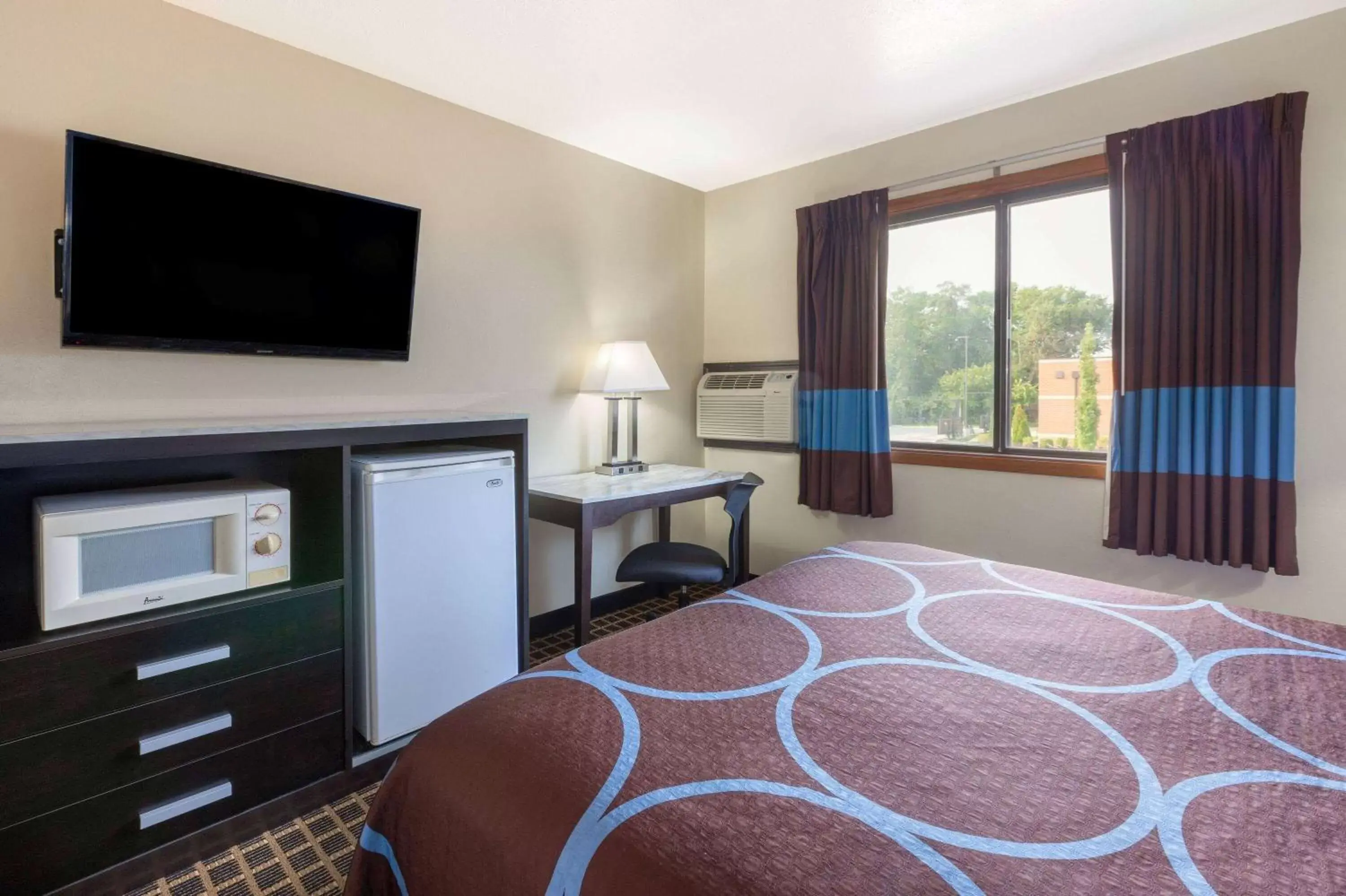 Photo of the whole room, TV/Entertainment Center in Super 8 by Wyndham Elkhart