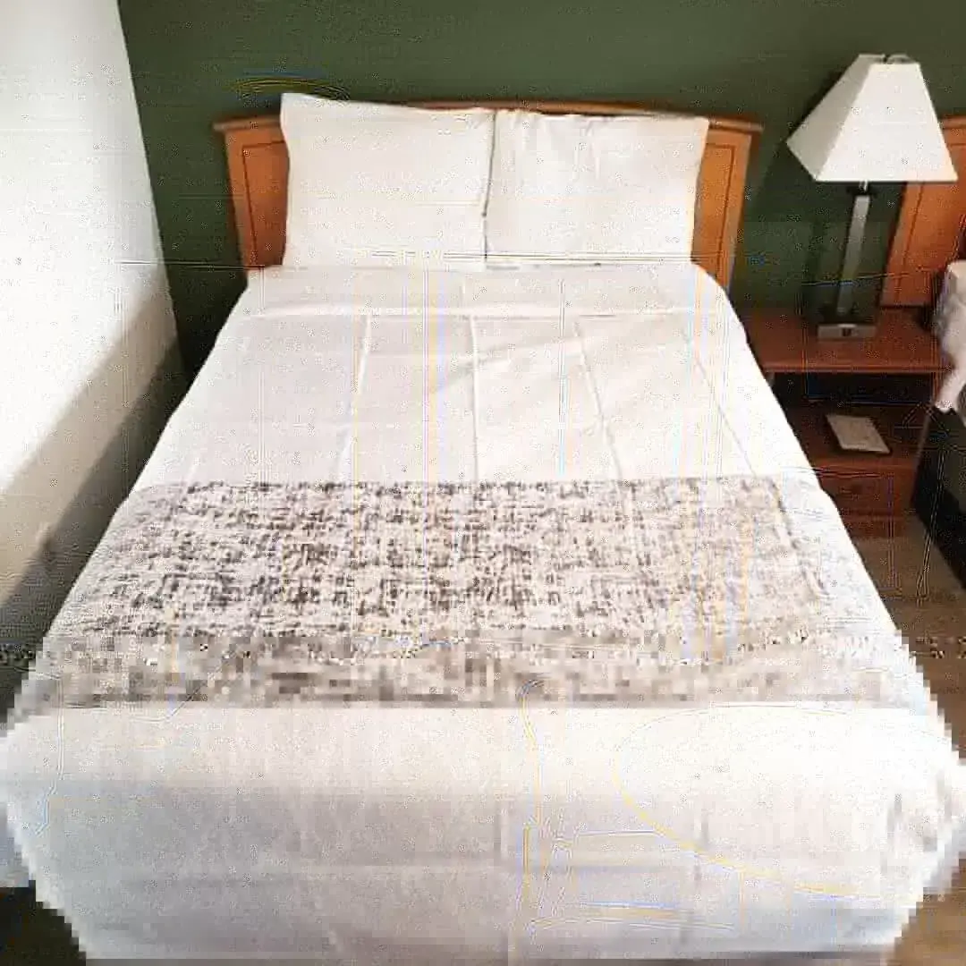 Bed in Deluxe Inn