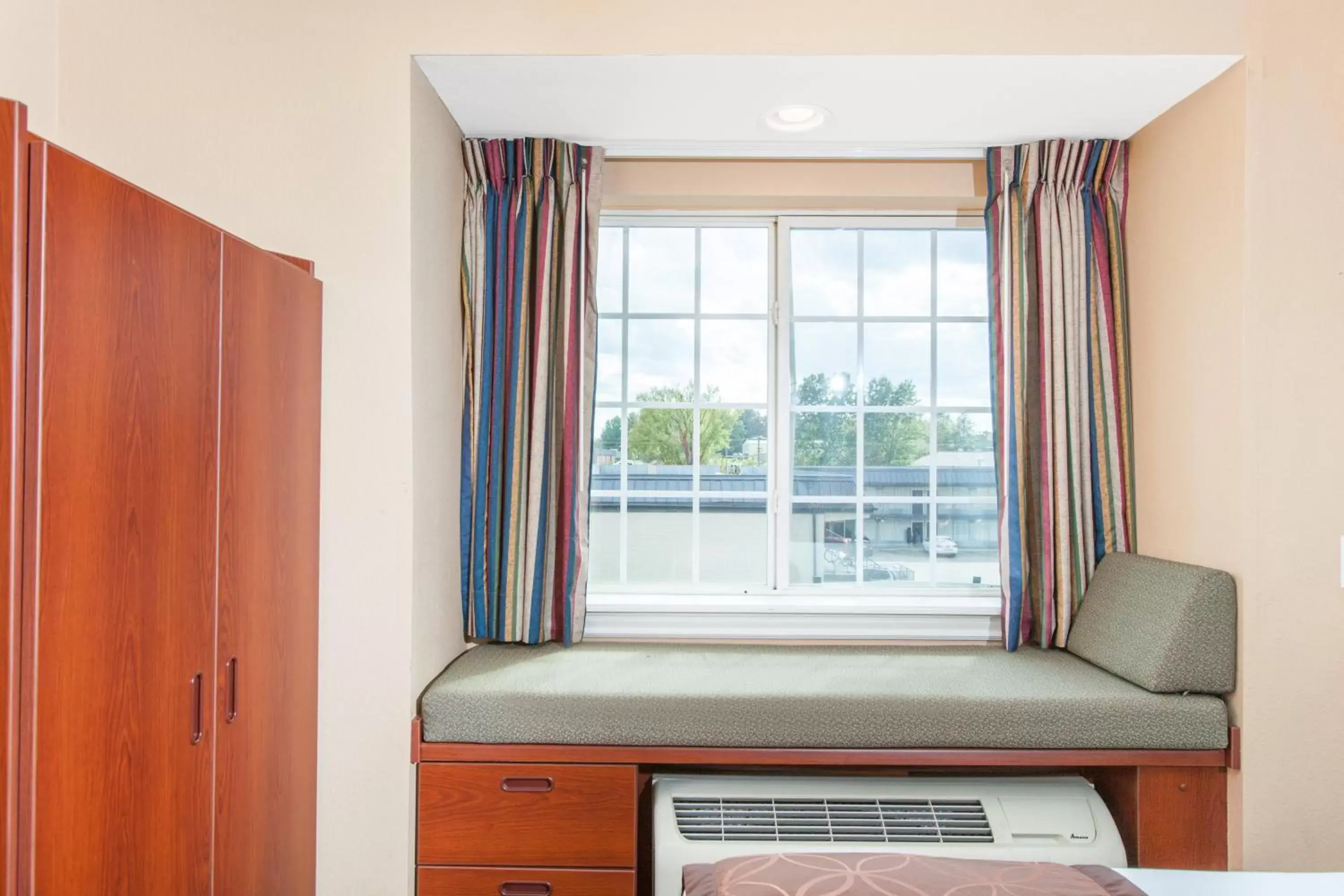 Bed in Microtel Inn by Wyndham Rogers Bed in Microtel Inn by Wyndham Rogers