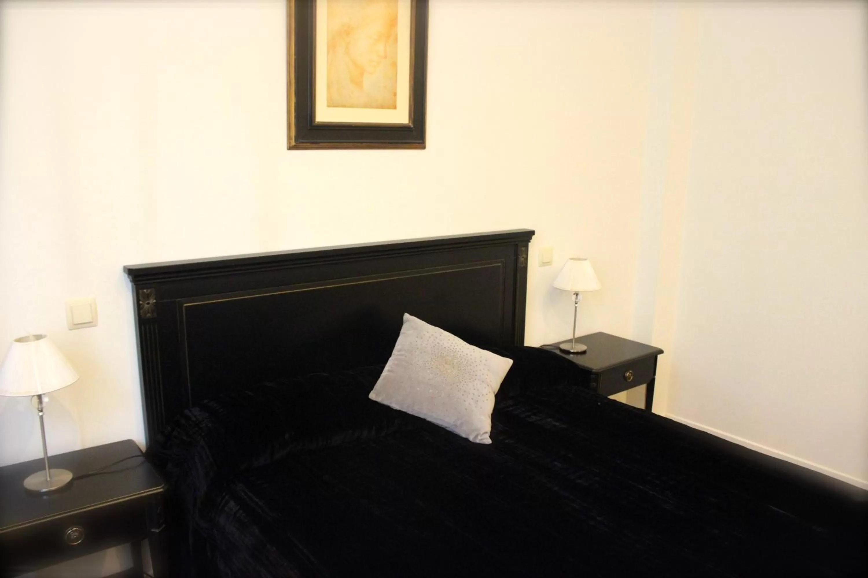 Bed in Casa Urbana Suites