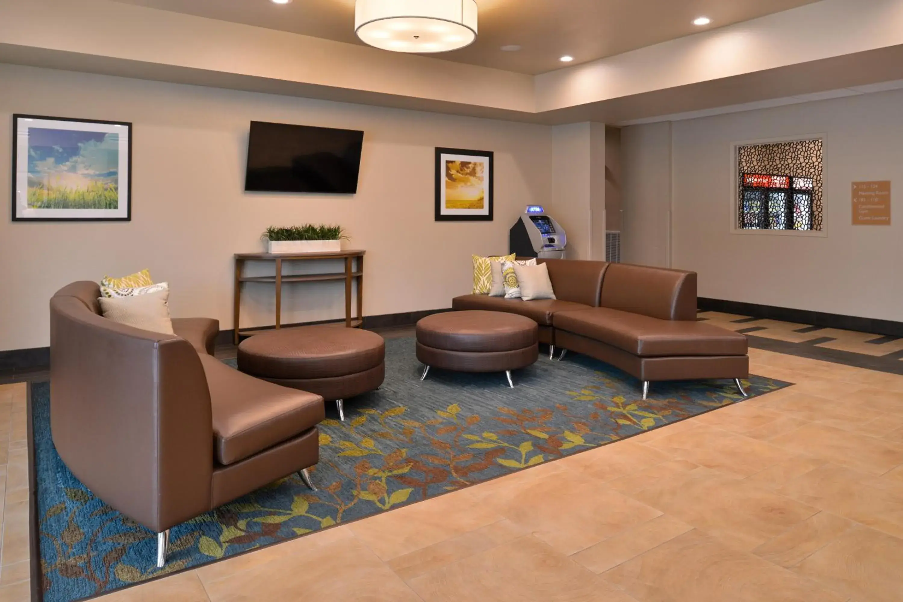 Lobby or reception, Seating Area in Candlewood Suites - Austin Airport, an IHG Hotel