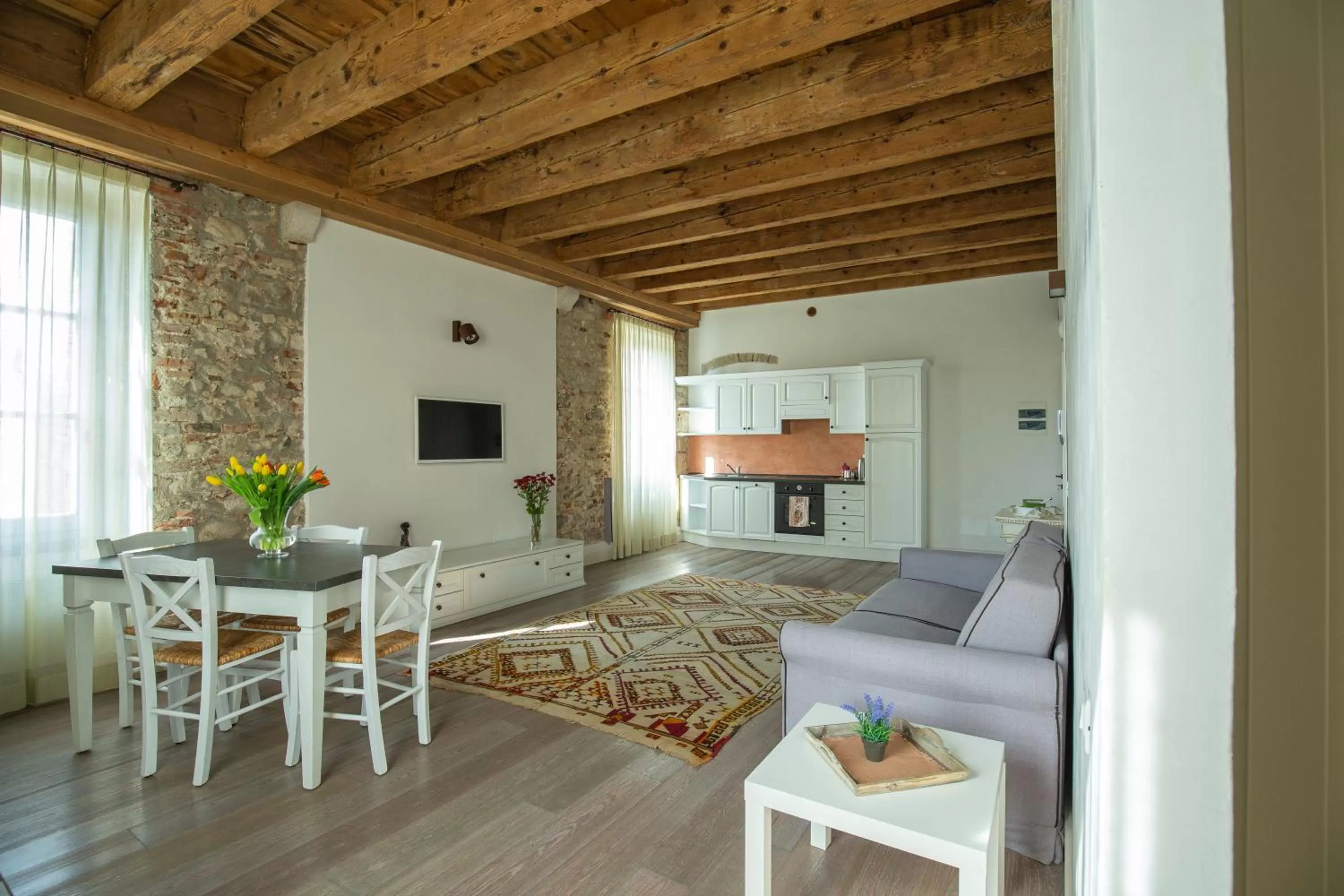 Living room in Residence Corte San Carlo