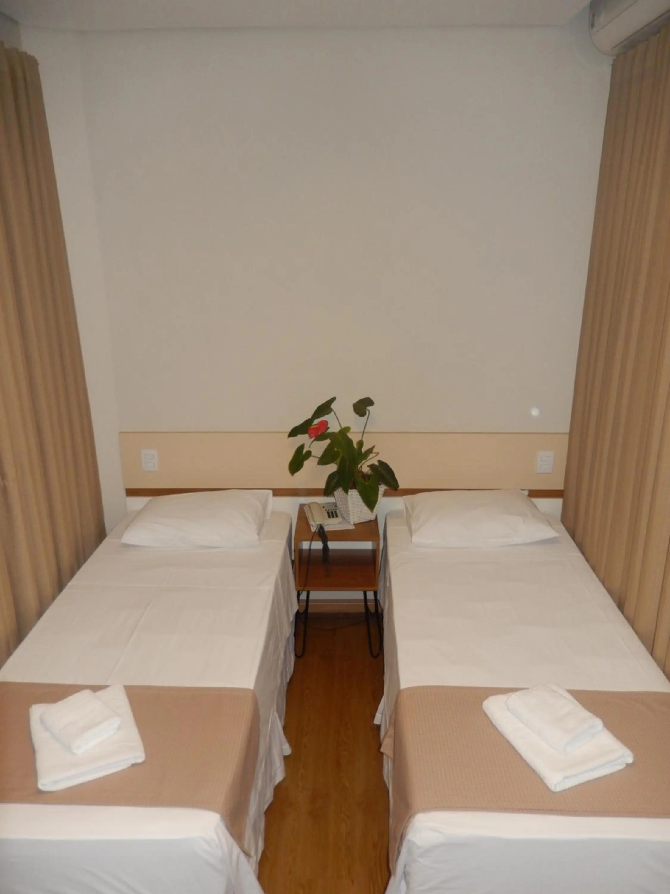 Bed in Hotel Metropole