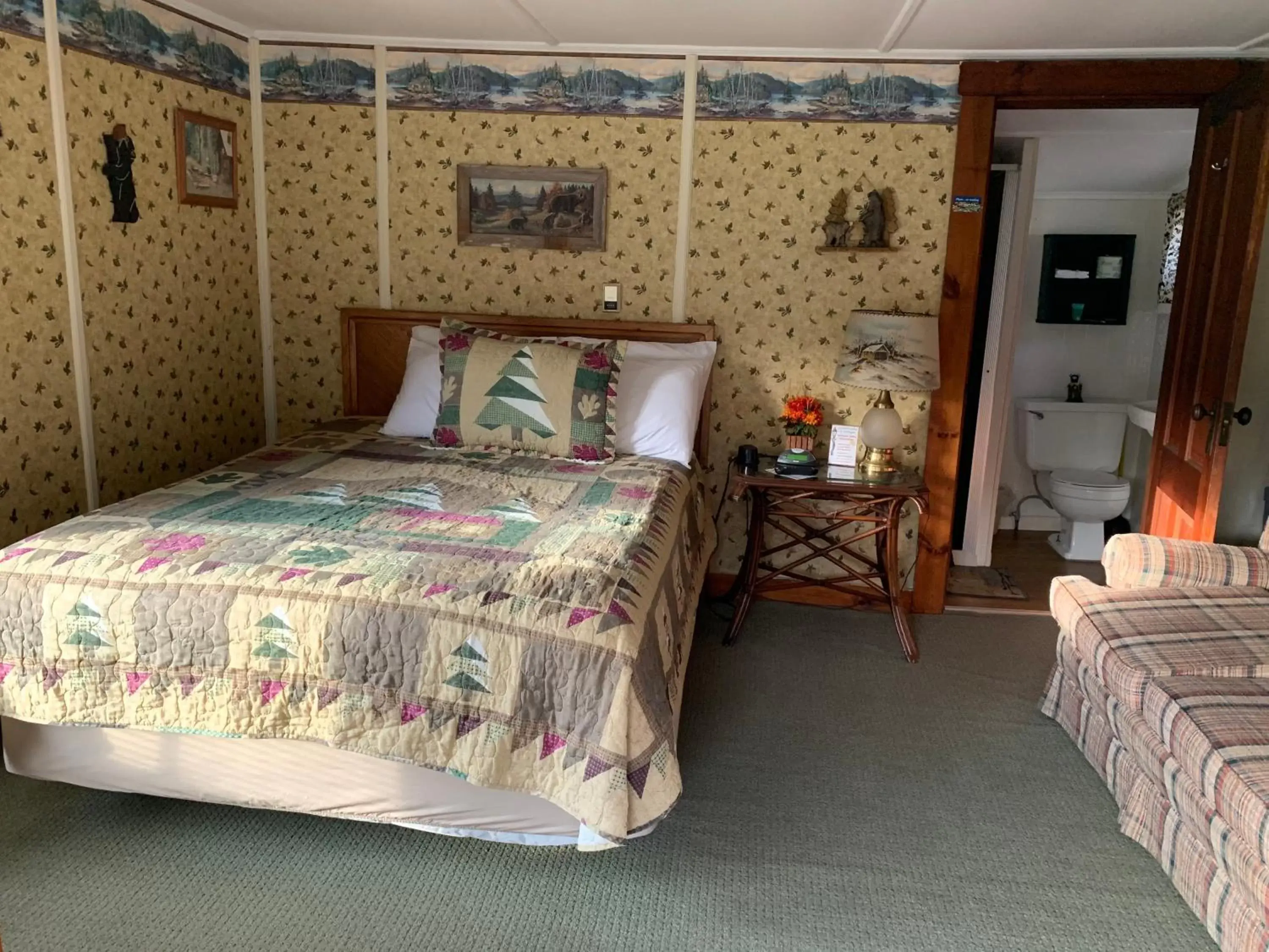 Bed in carrollmotel and cottages