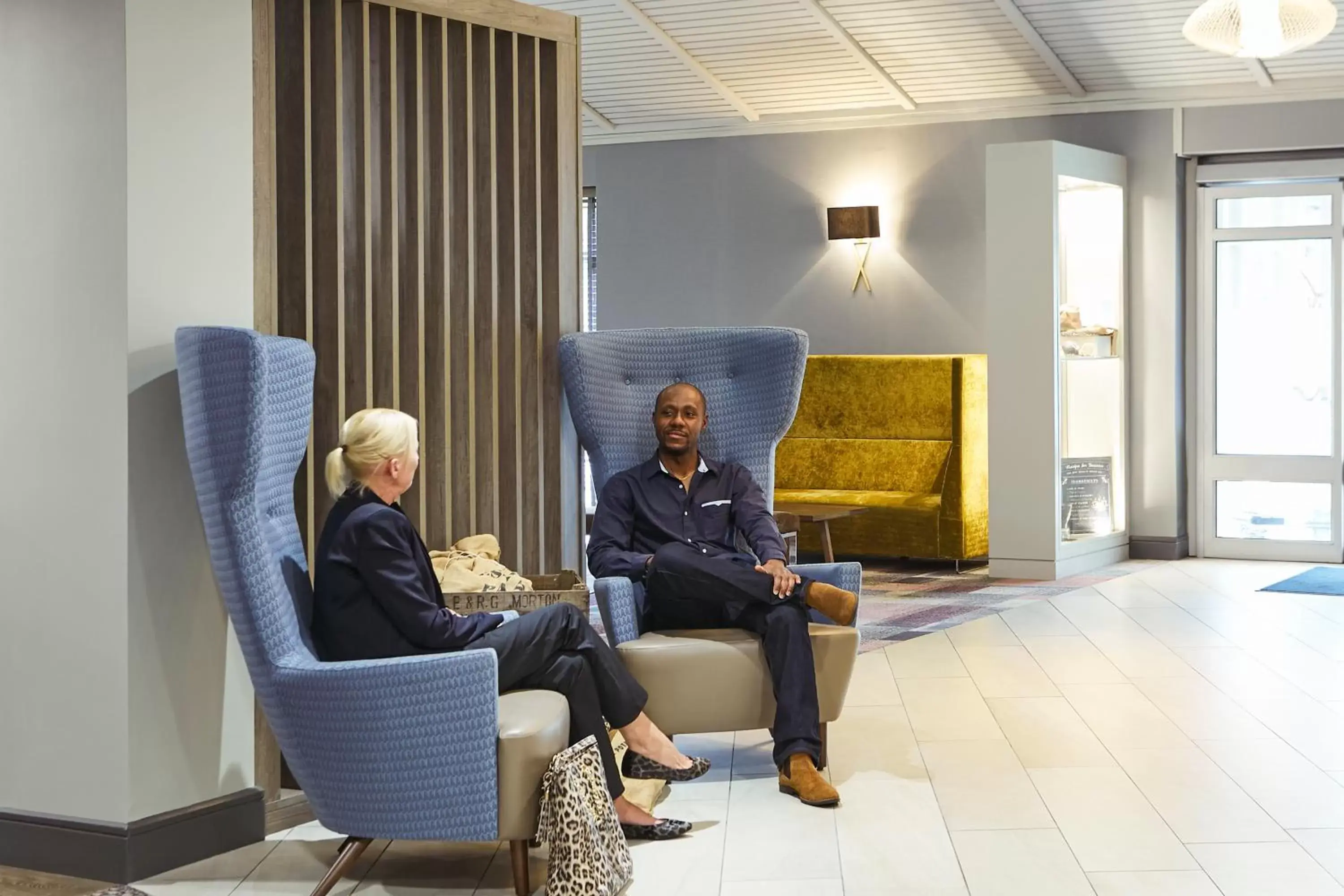 Communal lounge/ TV room in Novotel Manchester West