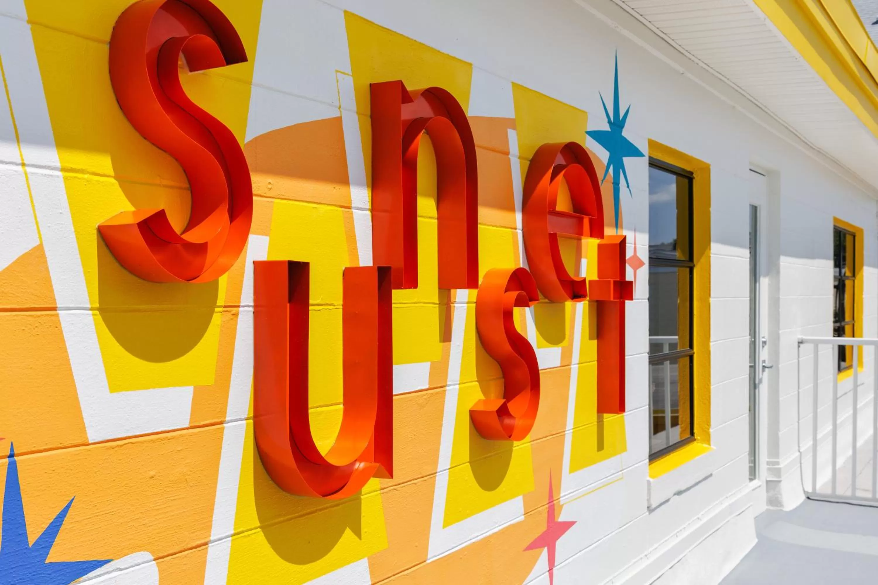 Property logo or sign in Sunset Inn and Cottages