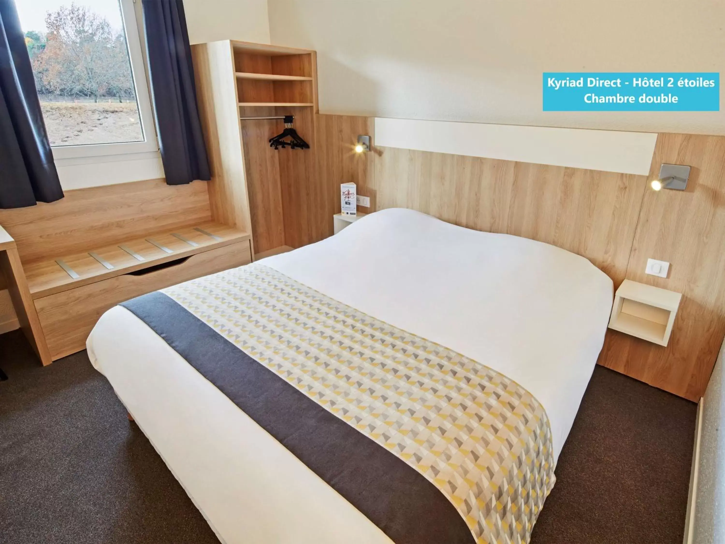 Bed in Kyriad Direct Auxerre - Appoigny