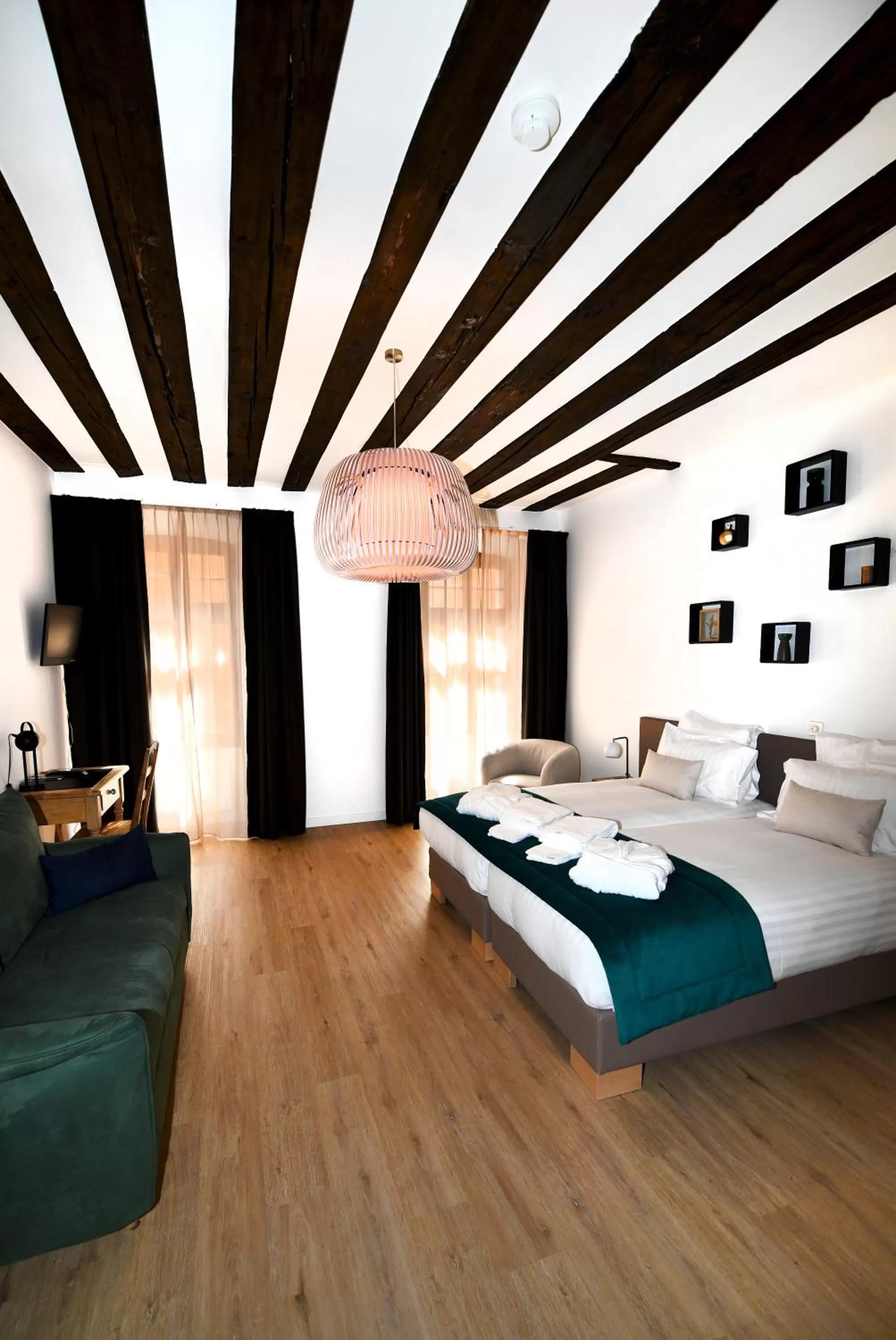 Photo of the whole room, Bed in Hôtel de Ville d'Ollon