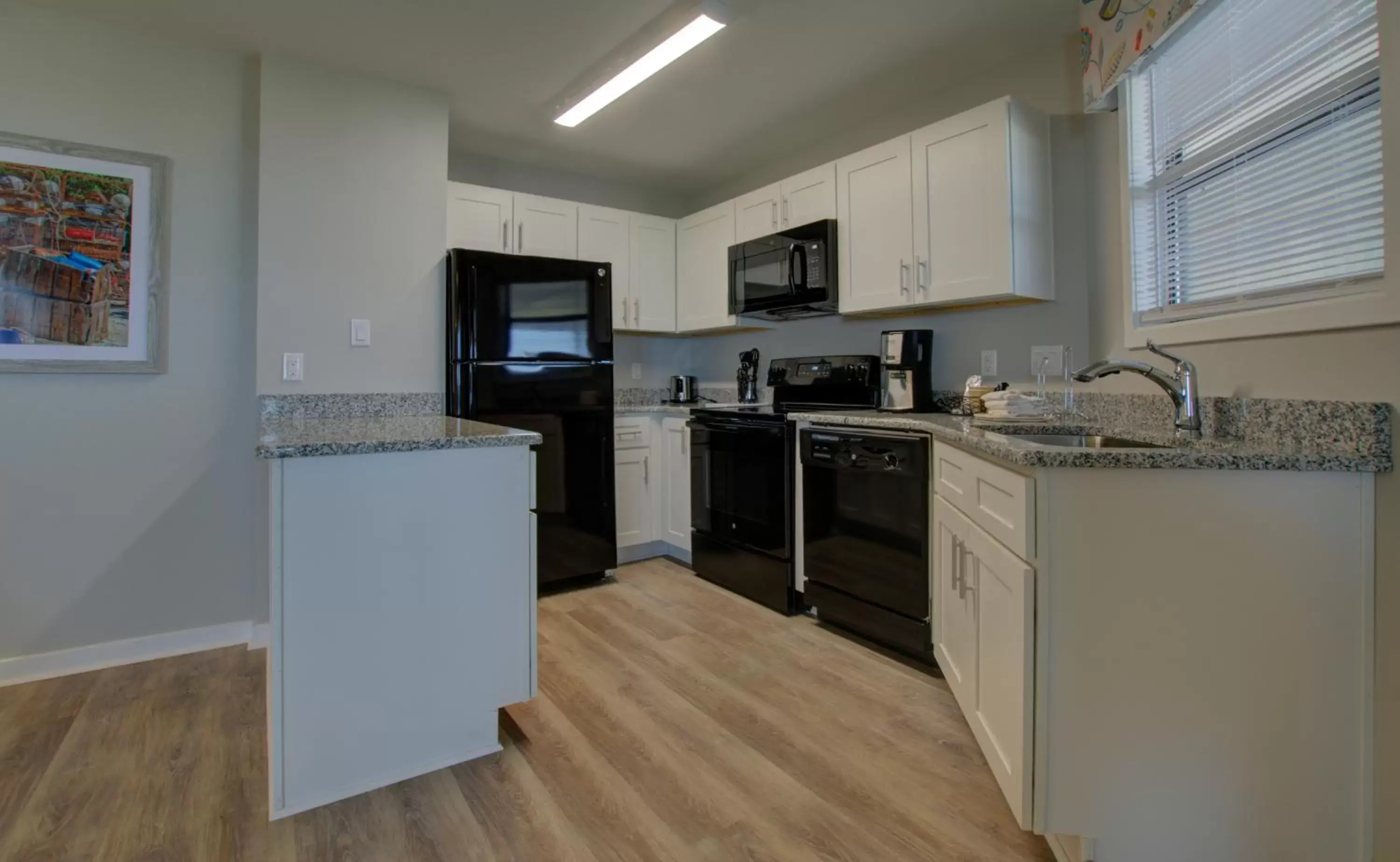 Kitchen or kitchenette, Kitchen/Kitchenette in Atlantic Beach Resort, a Ramada by Wyndham