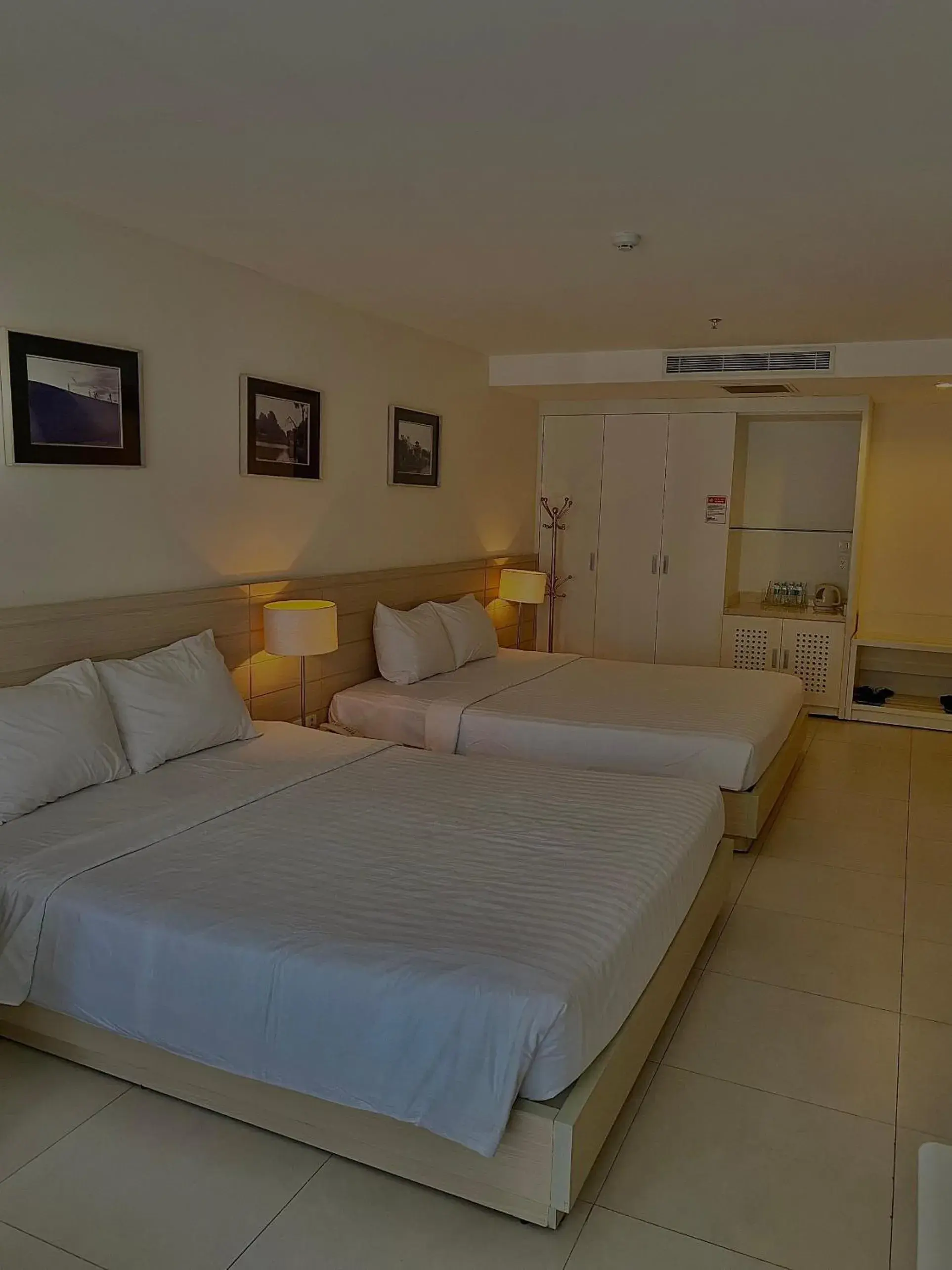 Bed in Nhi Phi Hotel