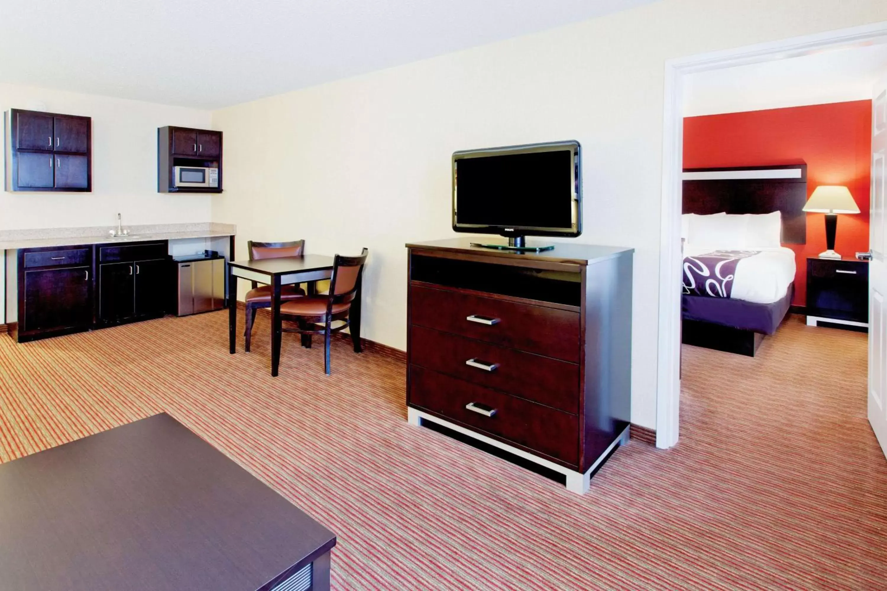 Photo of the whole room, TV/Entertainment Center in La Quinta by Wyndham Warner Robins - Robins AFB