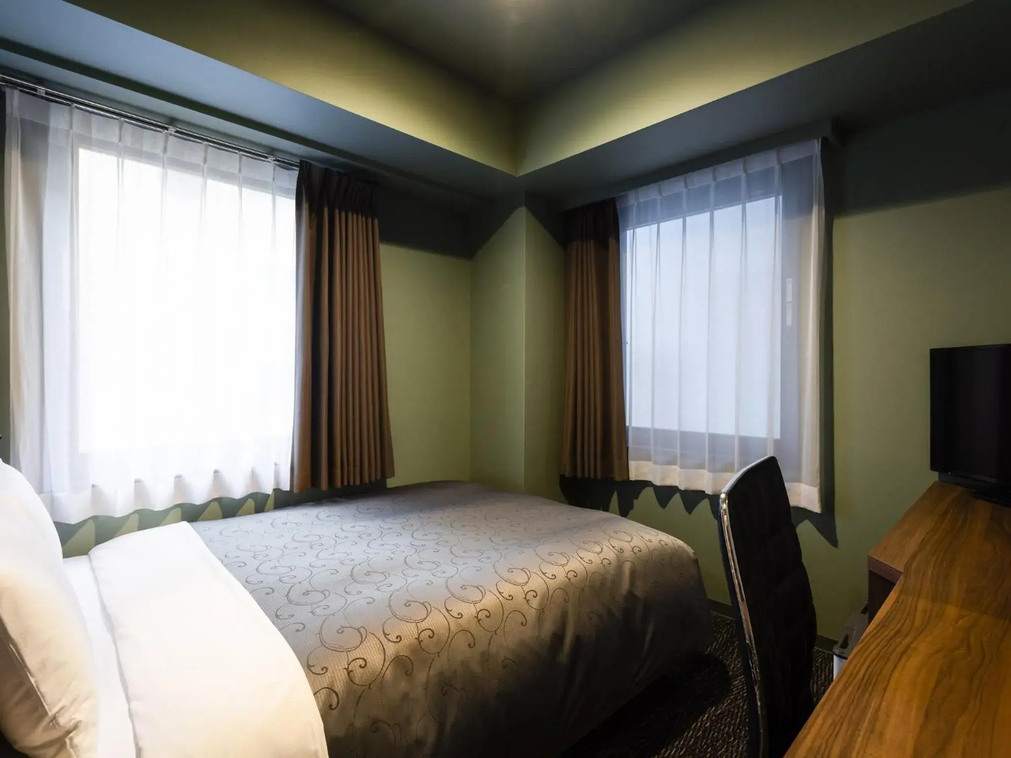 Bed in Hotel Wing International Shimbashi Onarimon