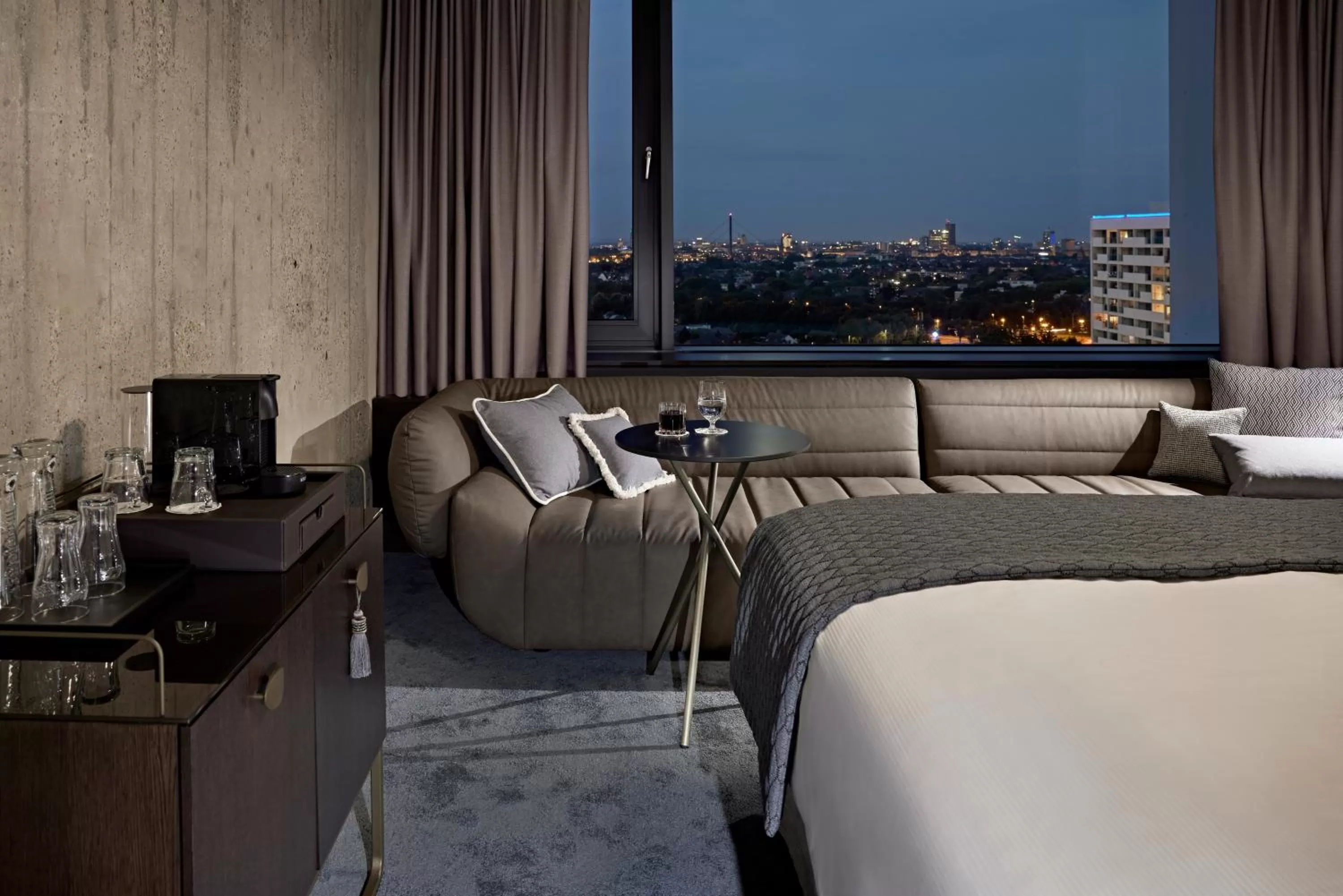 Seating area, Bed in Lindner Hotel Dusseldorf Seestern, part of JdV by Hyatt