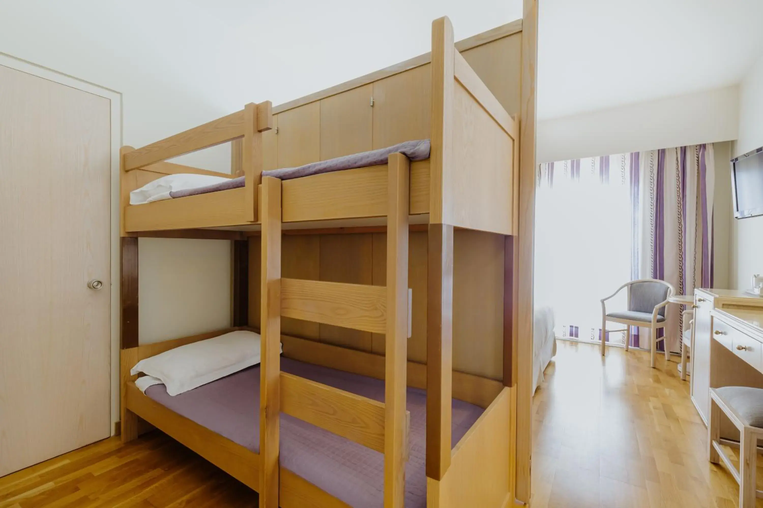 Bedroom, Bunk Bed in Golden Coast Beach Hotel