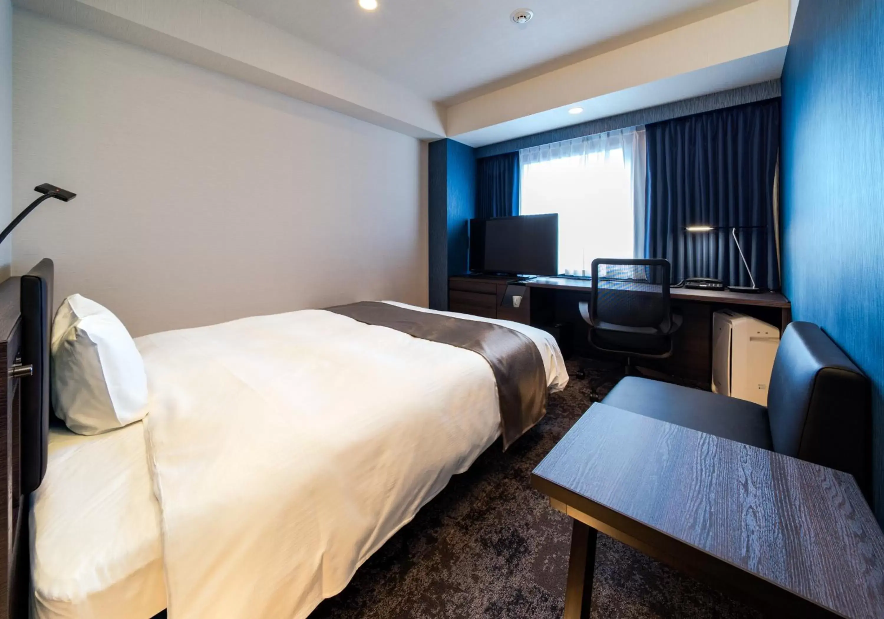 Photo of the whole room, Bed in Daiwa Roynet Hotel Koriyama Ekimae