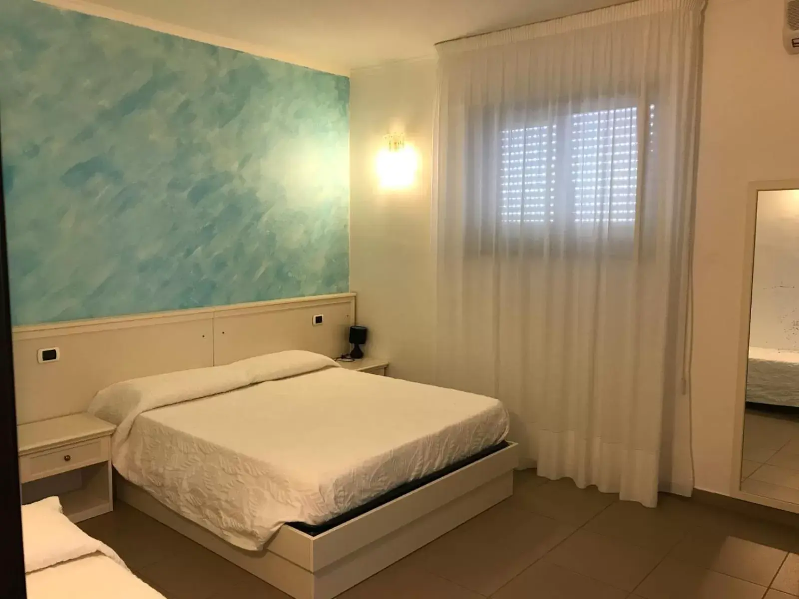 Triple Room in Pescasubacquea Triple Room in Pescasubacquea