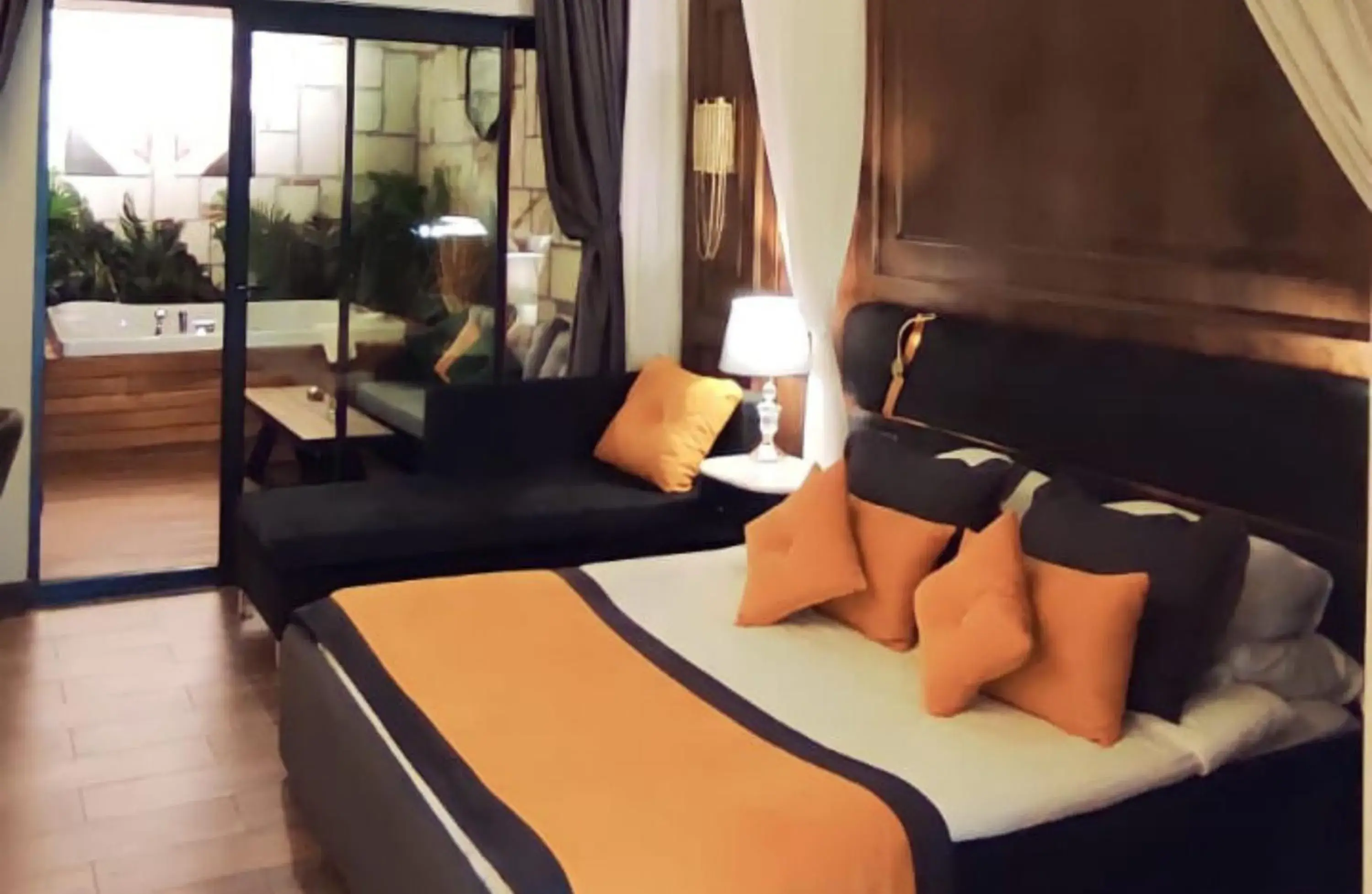 Bed in TNR BOUTIQUE HOTEL SPA
