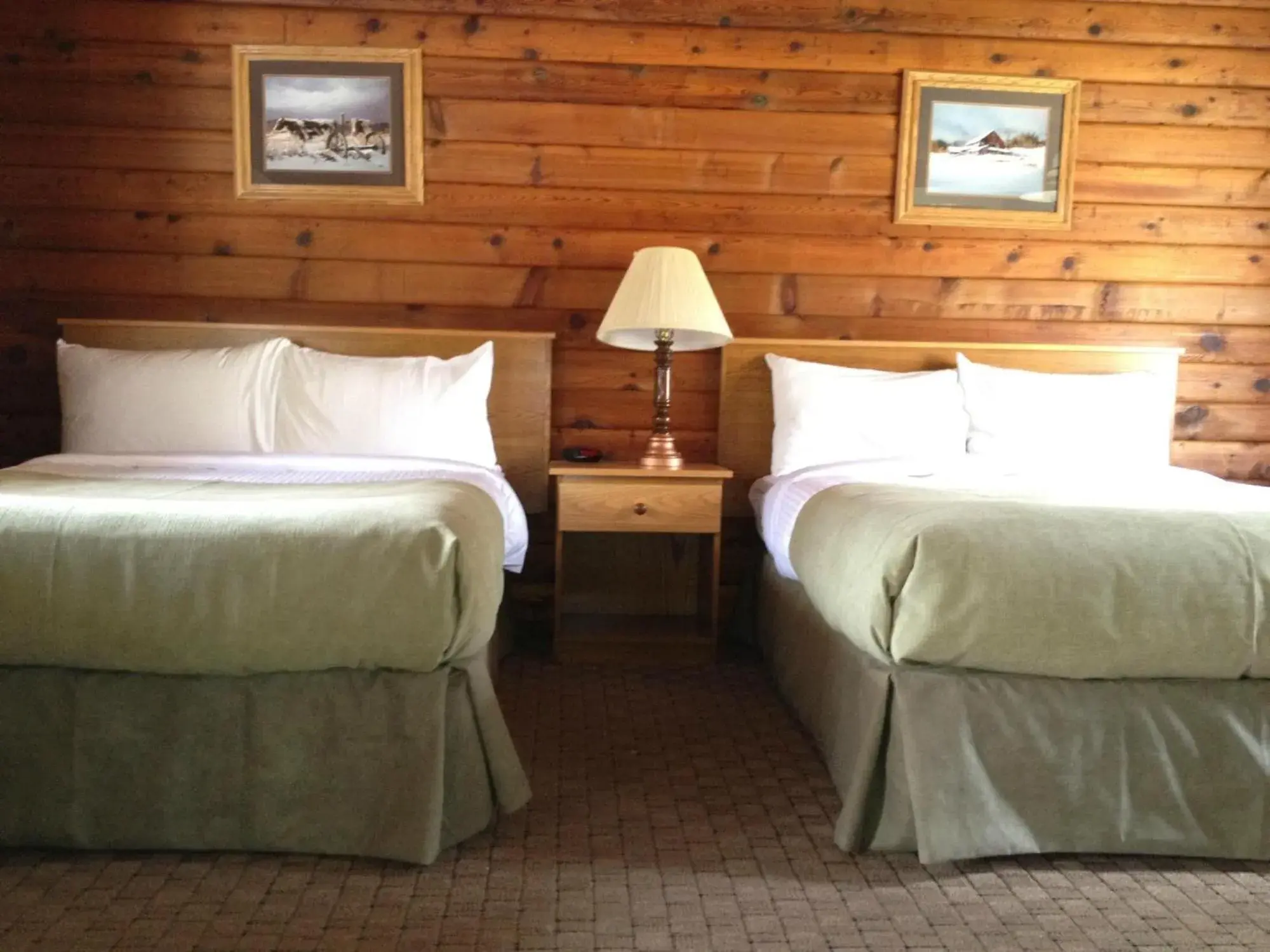 Bed in Jasper House Bungalows