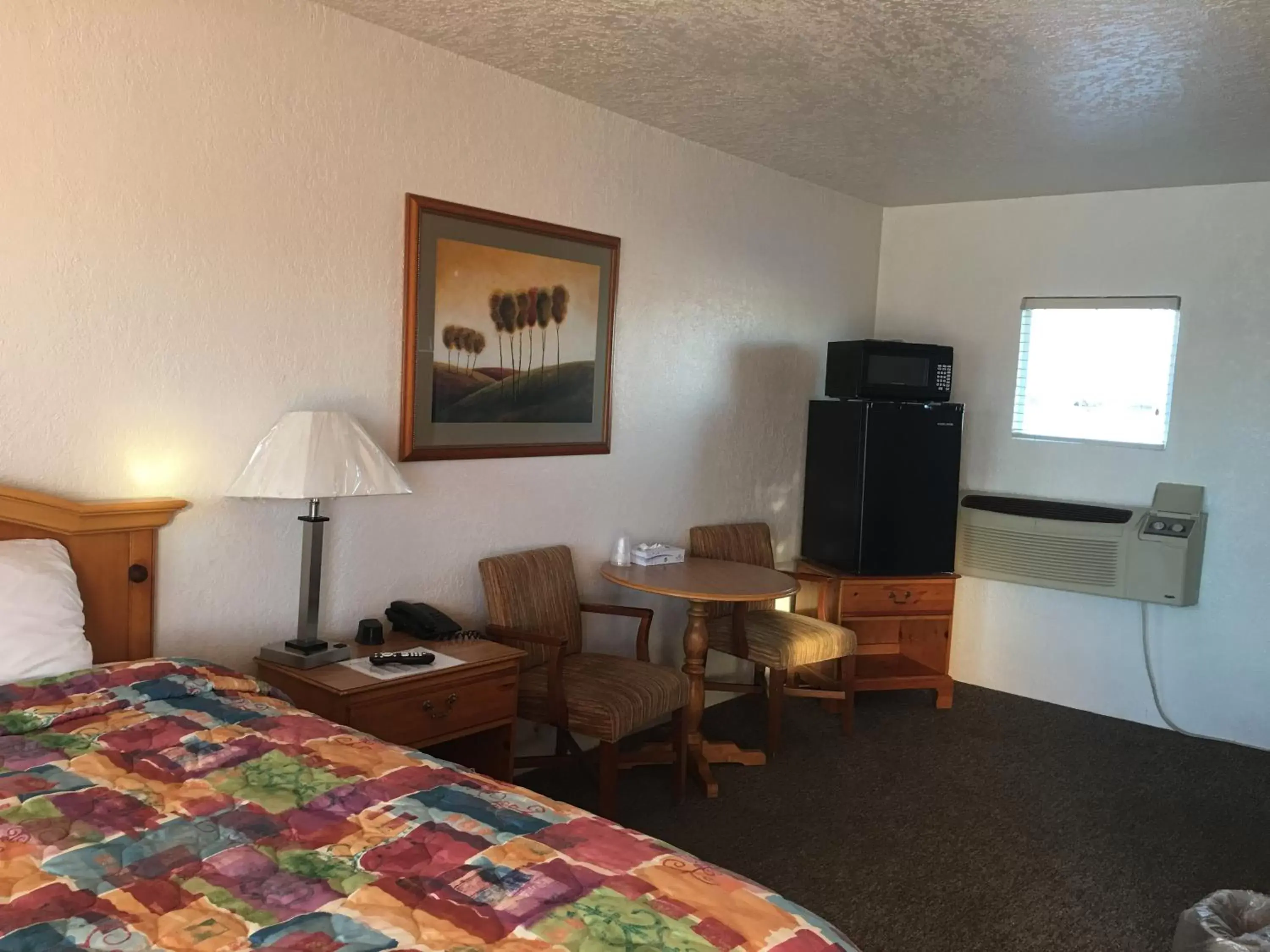 Bed, Seating Area in Circle S Lodge