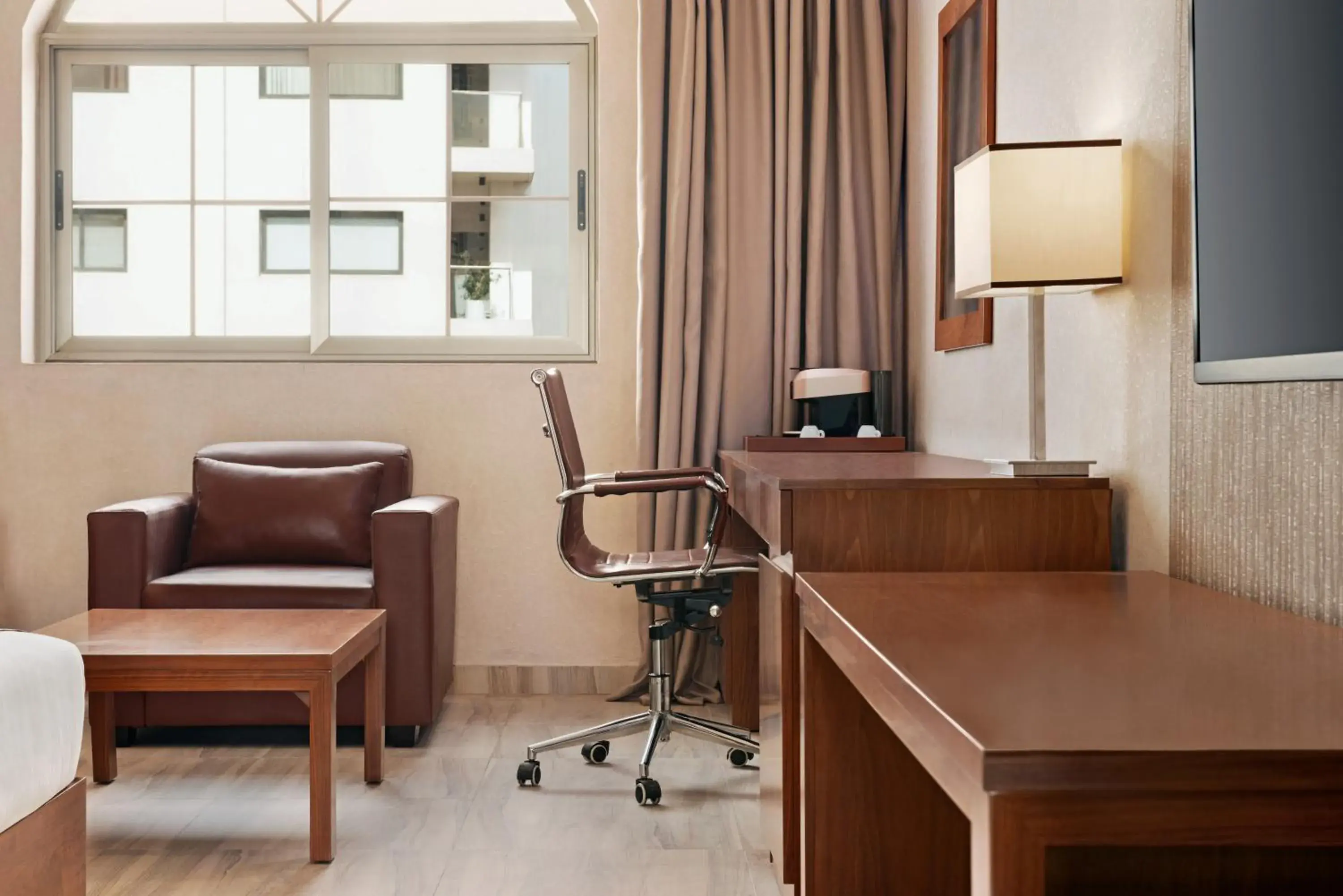 Living room in Days Hotel & Suites by Wyndham Dakar Living room in Days Hotel & Suites by Wyndham Dakar