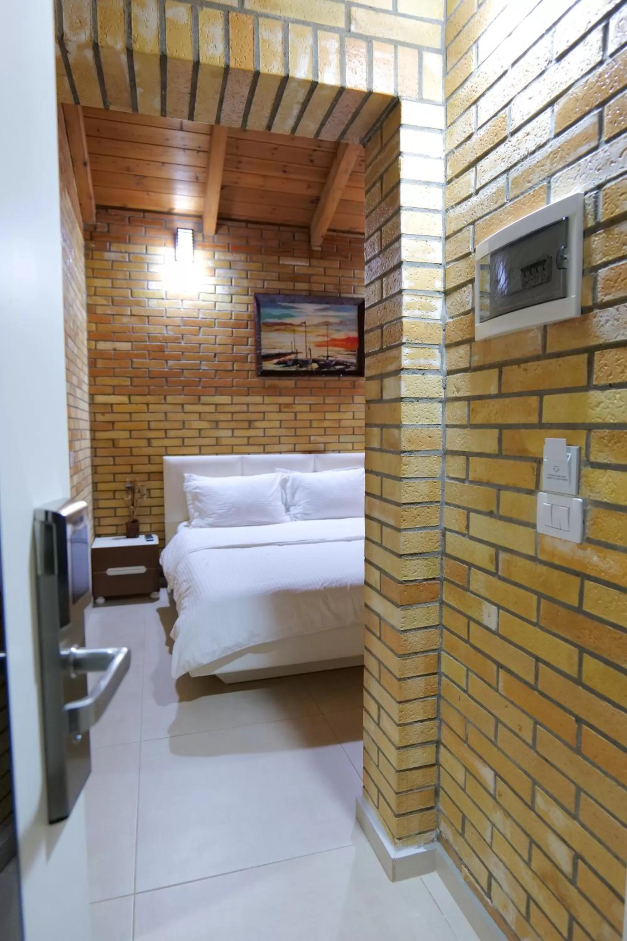 Seating area, Bed in Hotel Piccolino